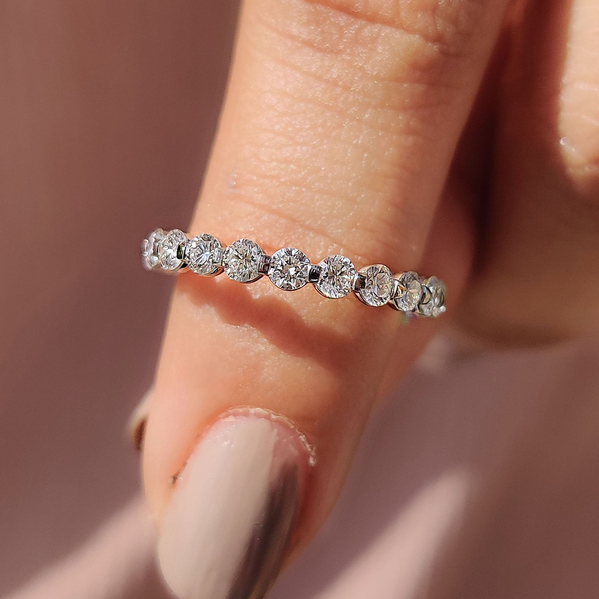 Shared Prong Eternity Band With Round Diamond