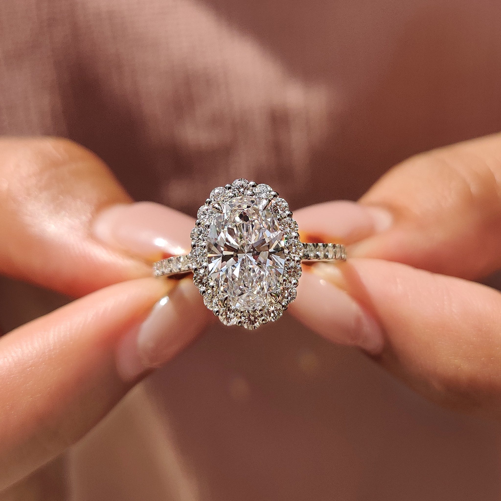 White Gold Oval Cut Cathedral Setting Ring