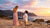 Surprise beach proposal at sunset with scenic coastal views