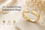 Gold tension setting engagement ring with floating round diamond design