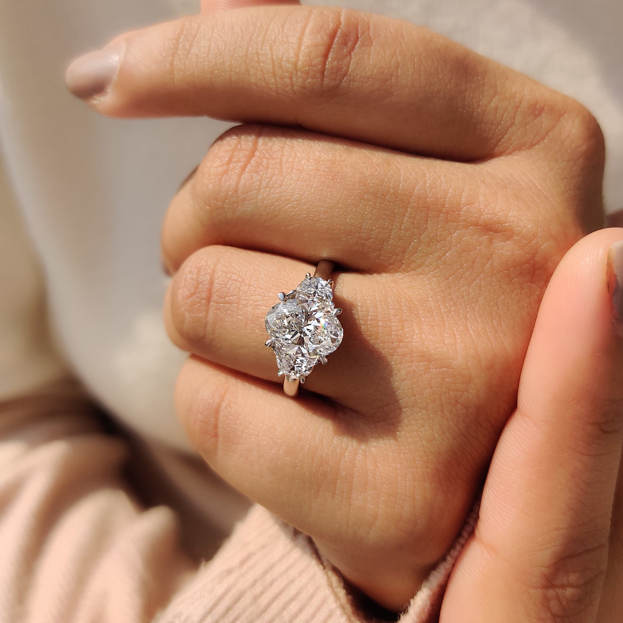 Oval Cut Diamond Engagement Ring With Half Moon Side Stone