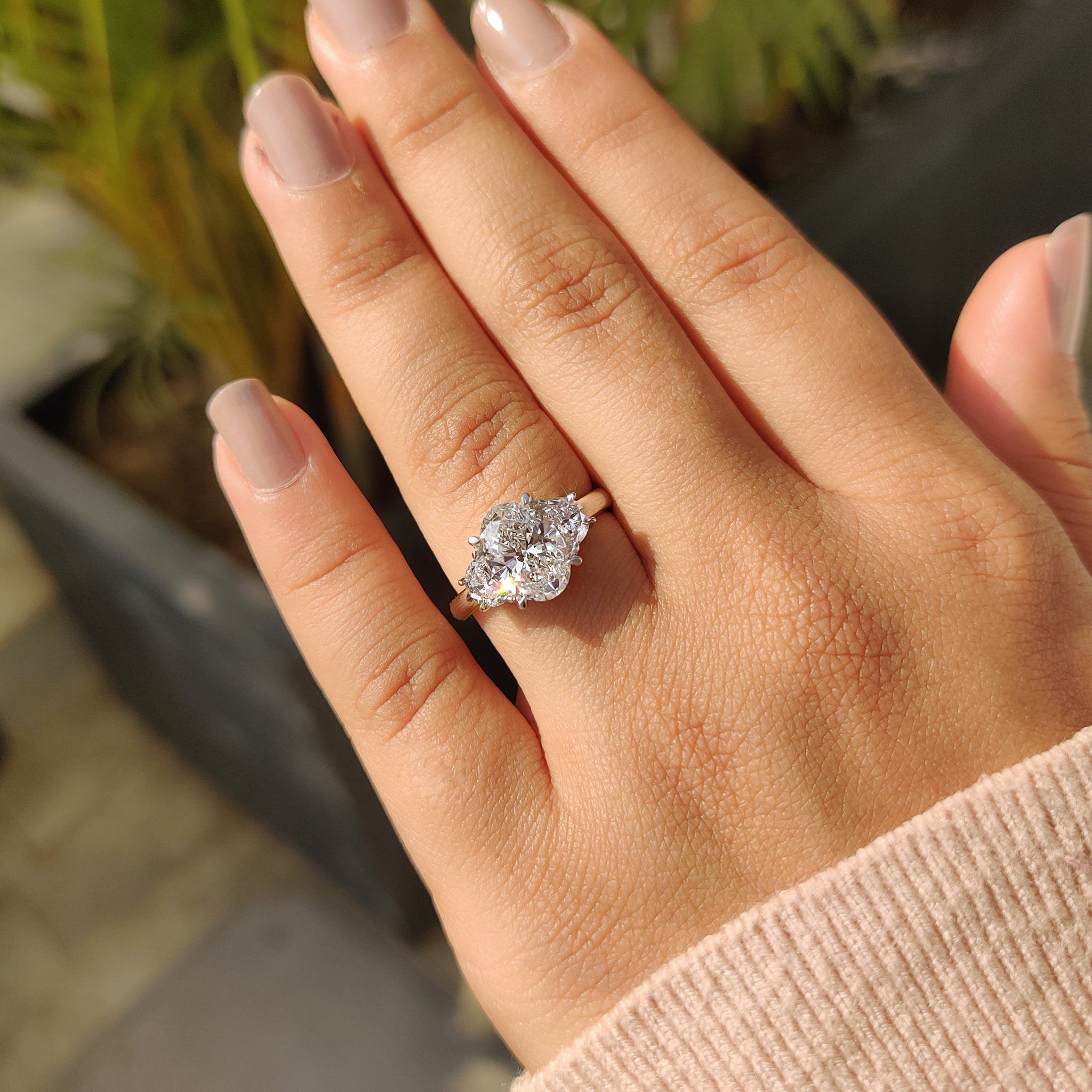 Oval Cut Diamond Engagement Ring With Half Moon Side Stone