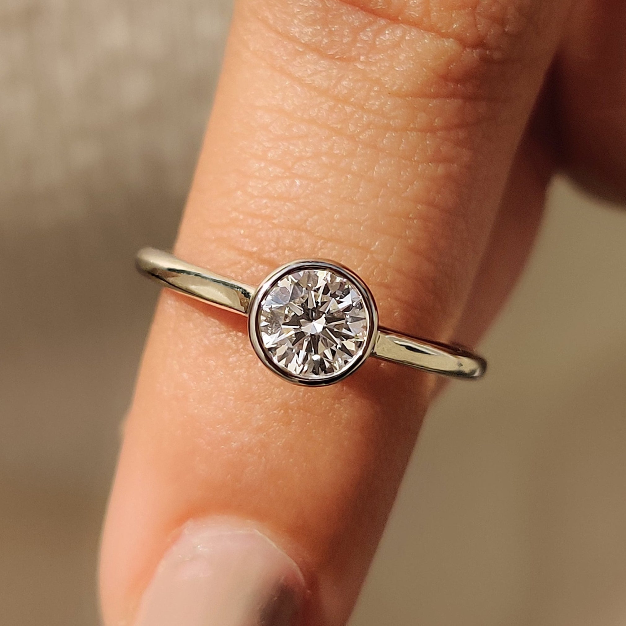 Bezel solitaire ring crafted for a contemporary look.
