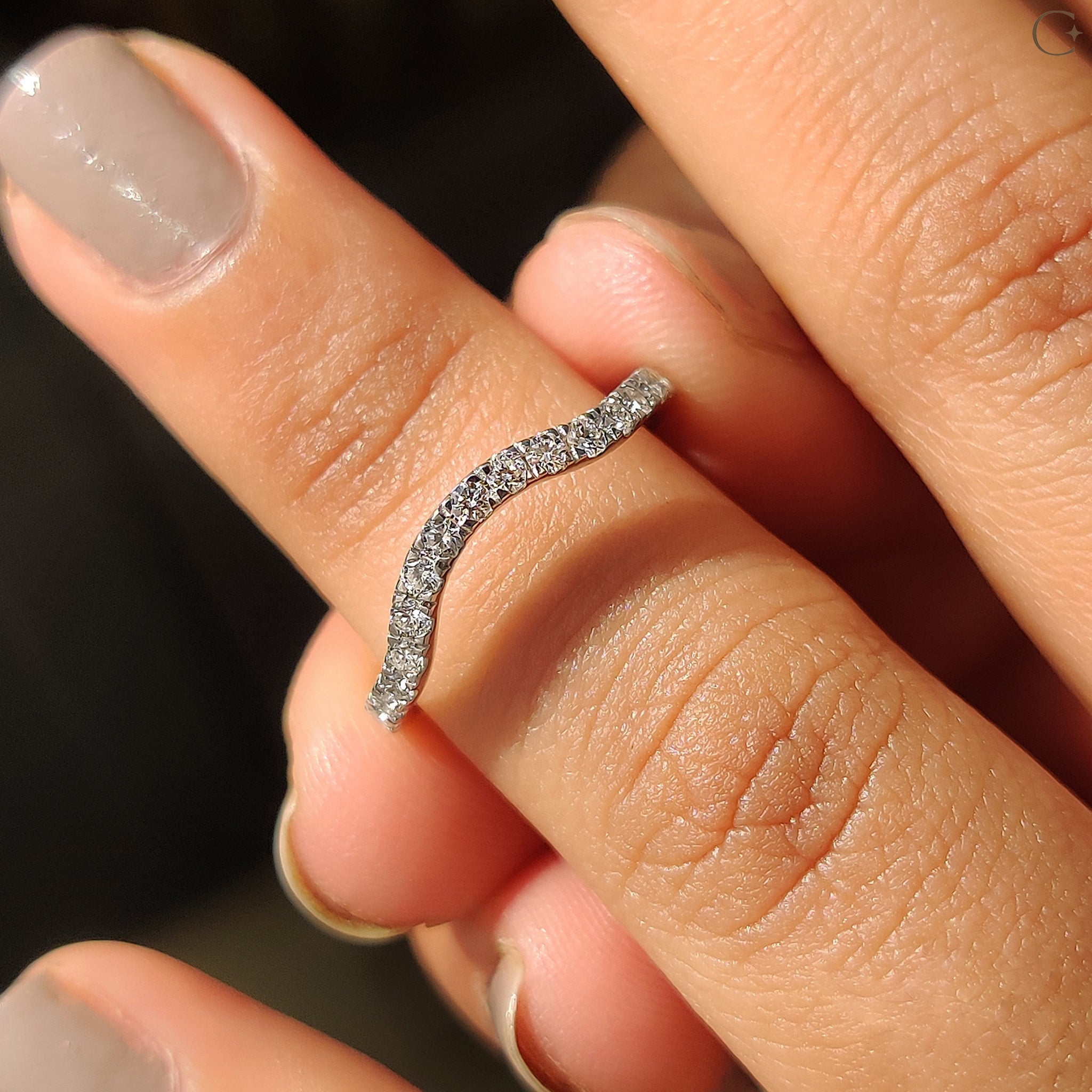 Stackable wedding band for a stylish layered look.