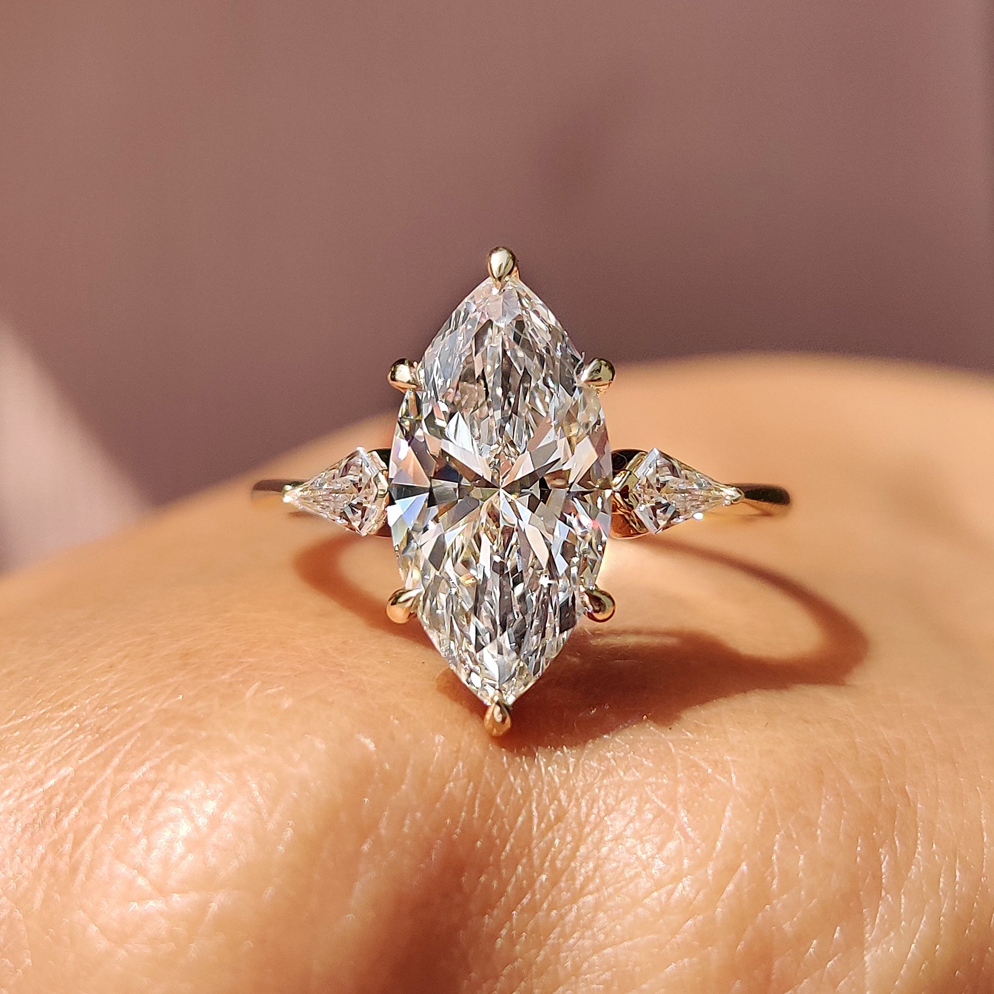 Marquise Diamond Ring With Kite Side Stone