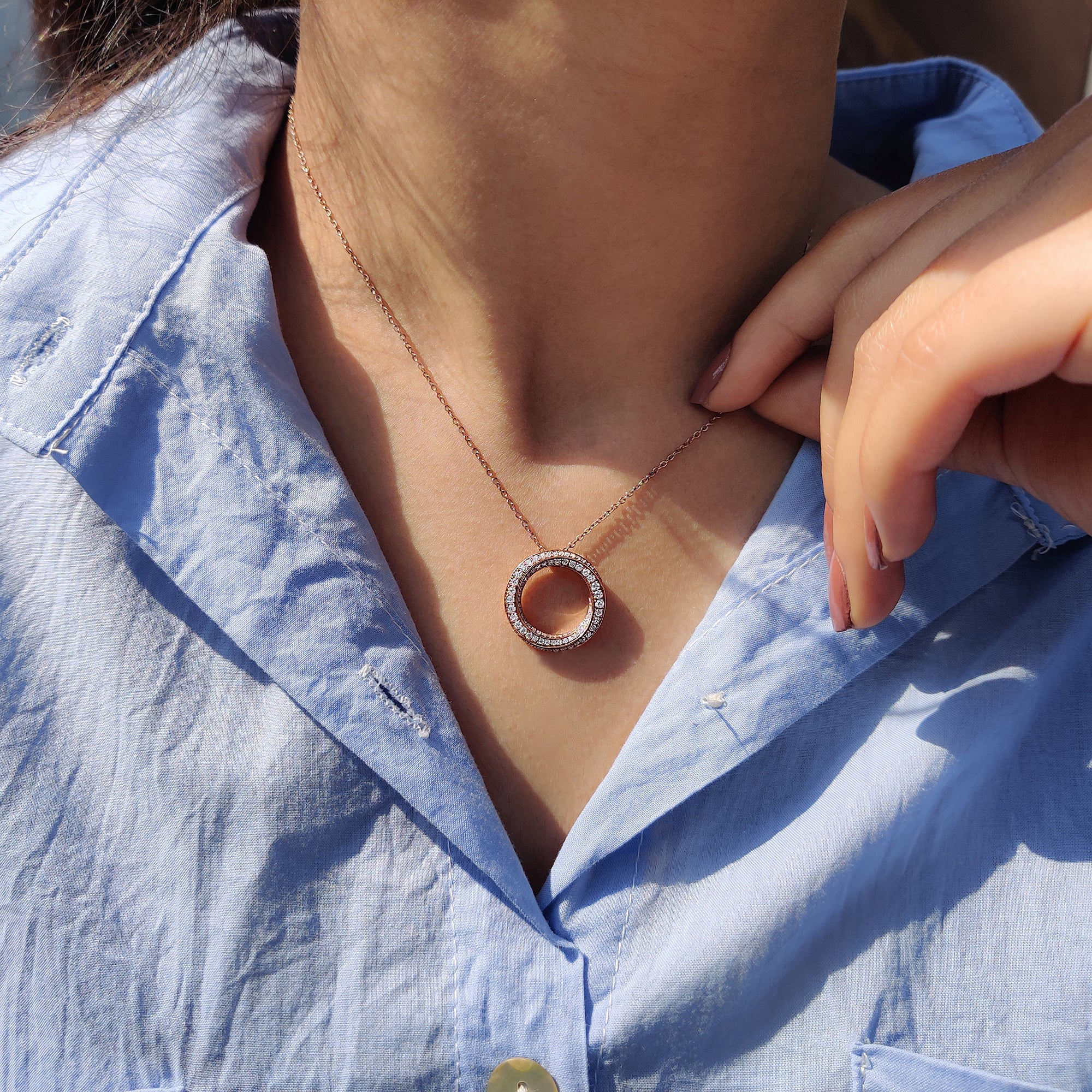 Twisted Multi Circle Moissanite Pendant styled with round cut Moissanite Pendant.

