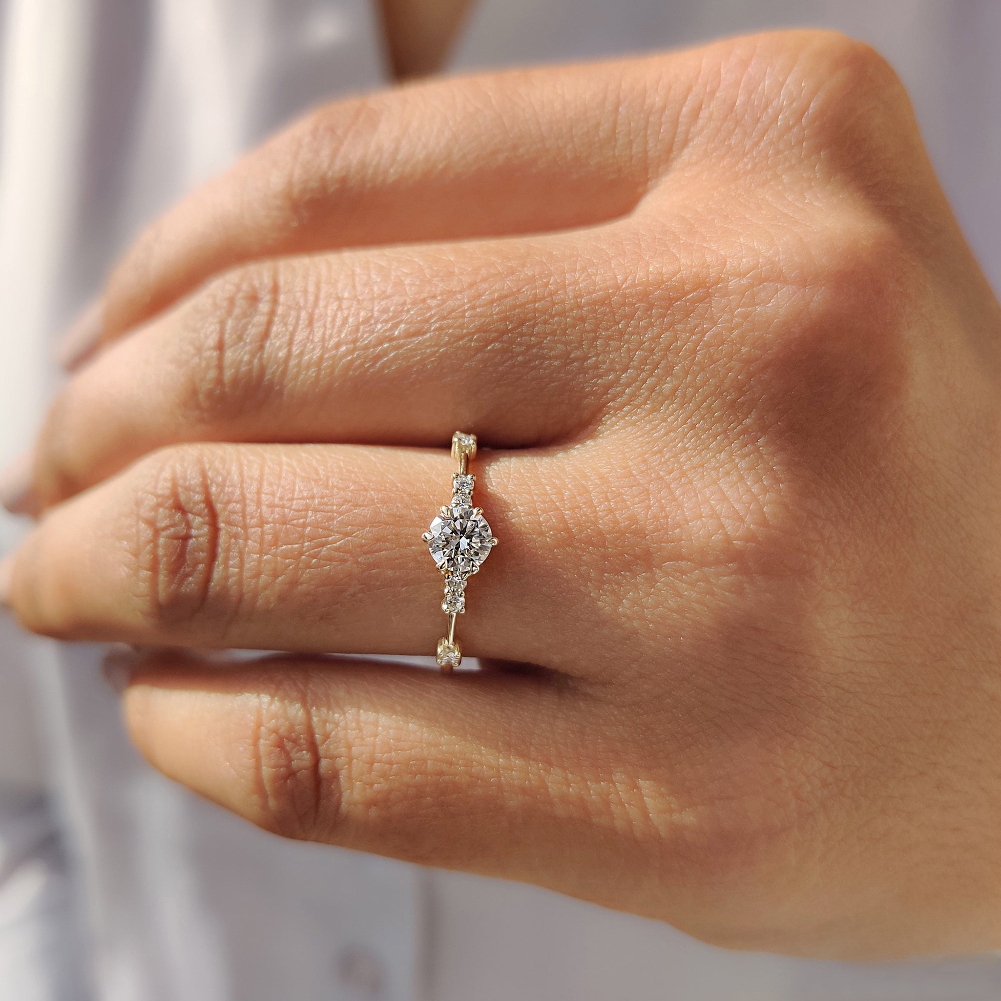 Six Prong Round Engagement Ring with brilliant diamonds.

