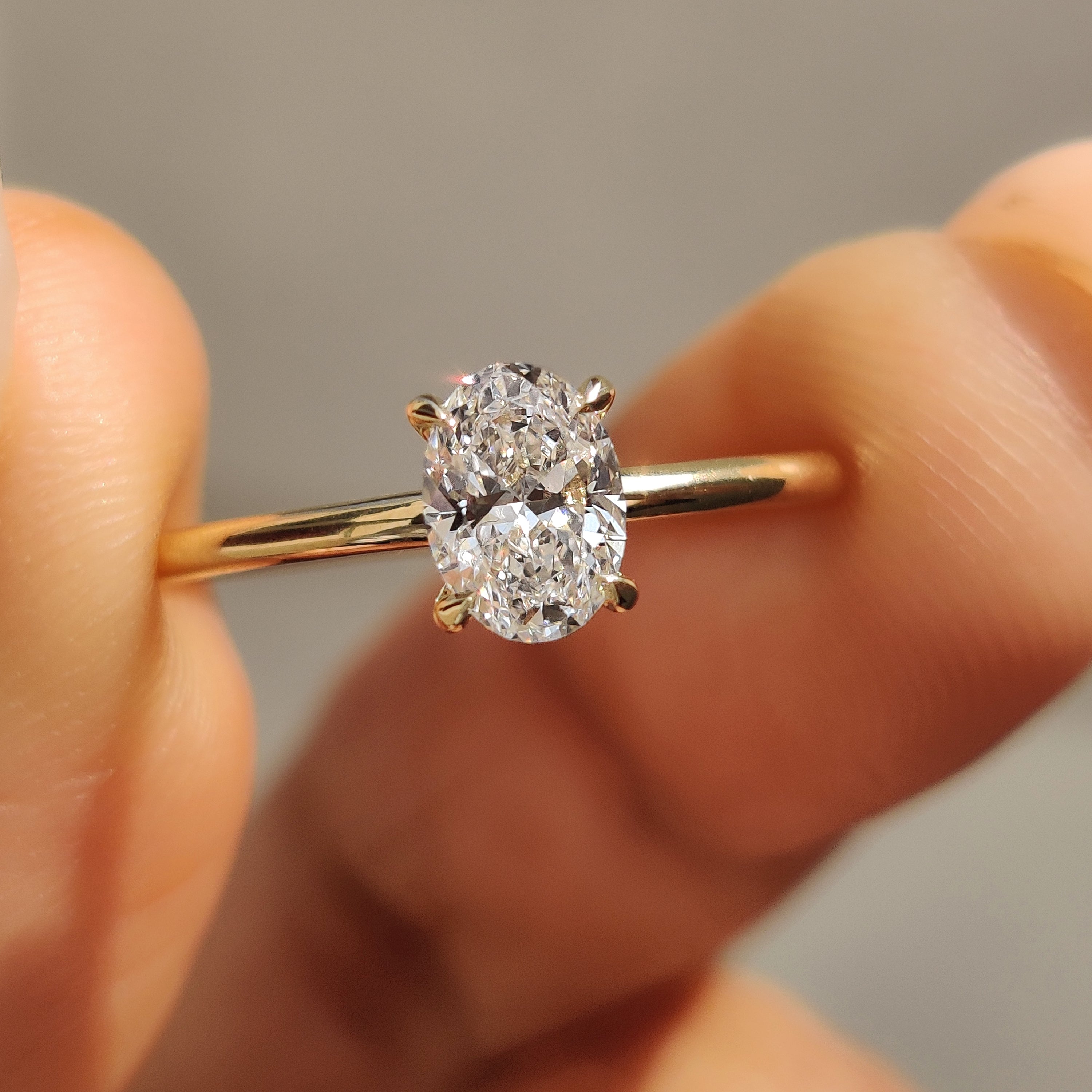 Oval Shaped Diamond Engagement Ring in Solitaire Setting