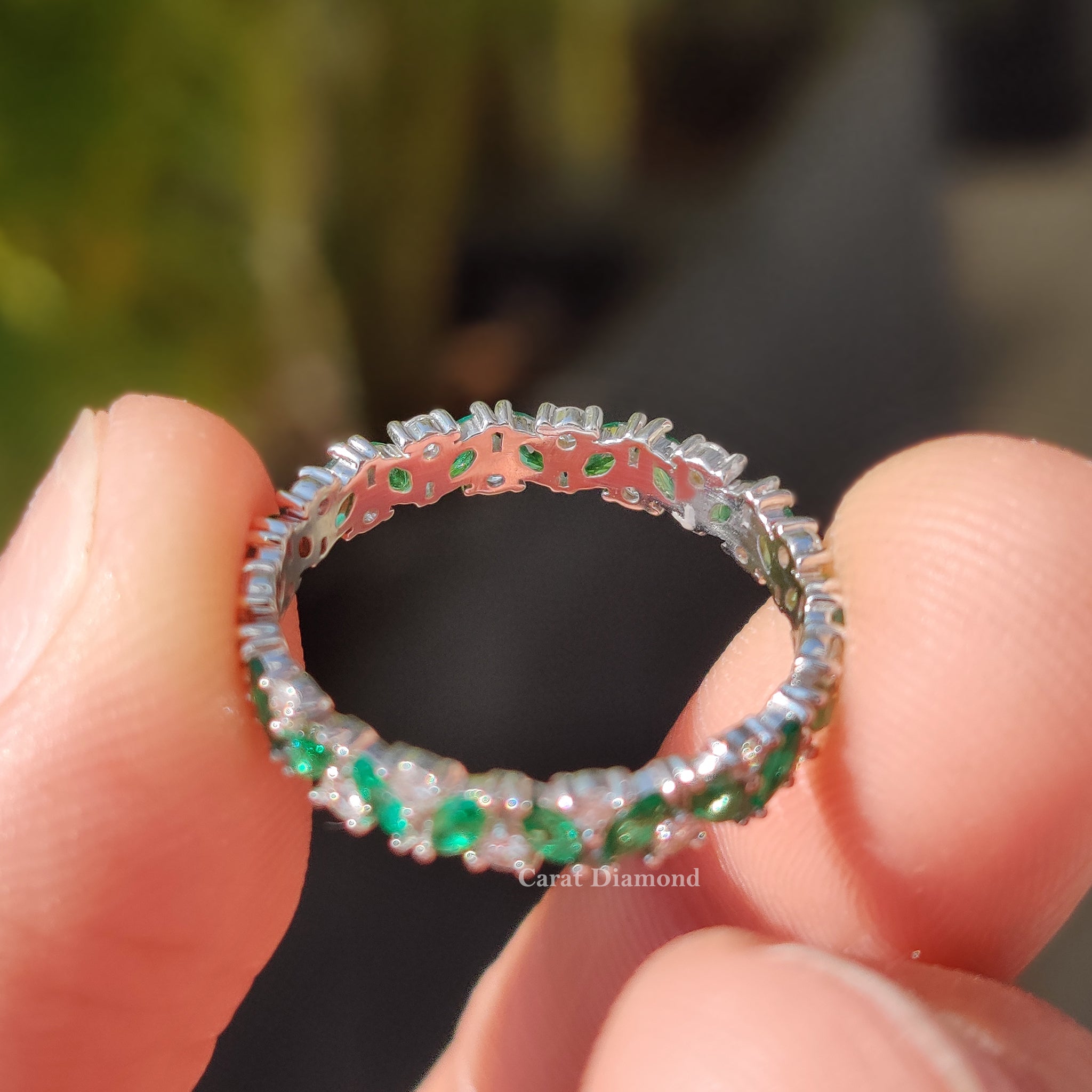 White gold wedding band with a polished finish.
