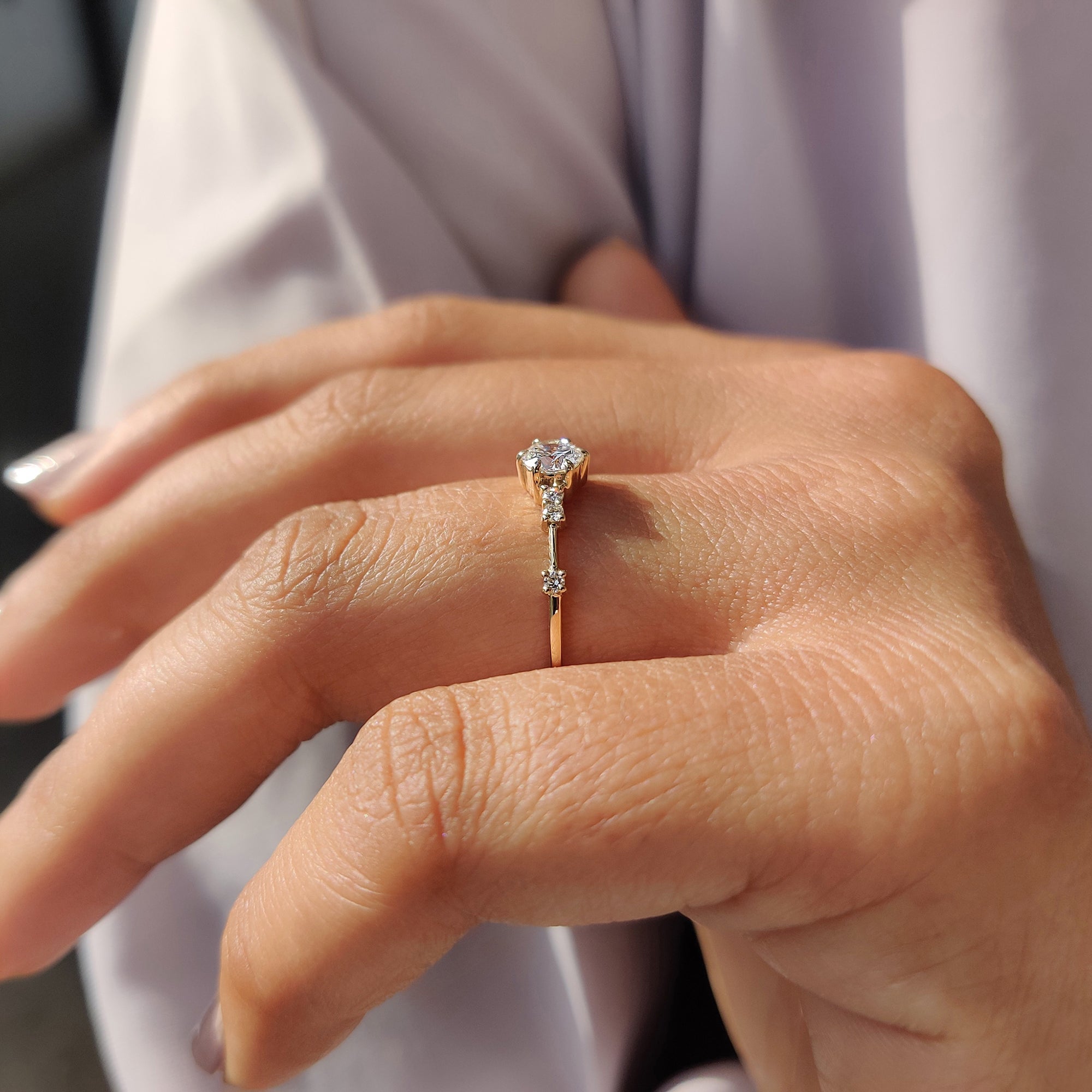 Yellow Gold Engagement Ring with a radiant round diamond.
