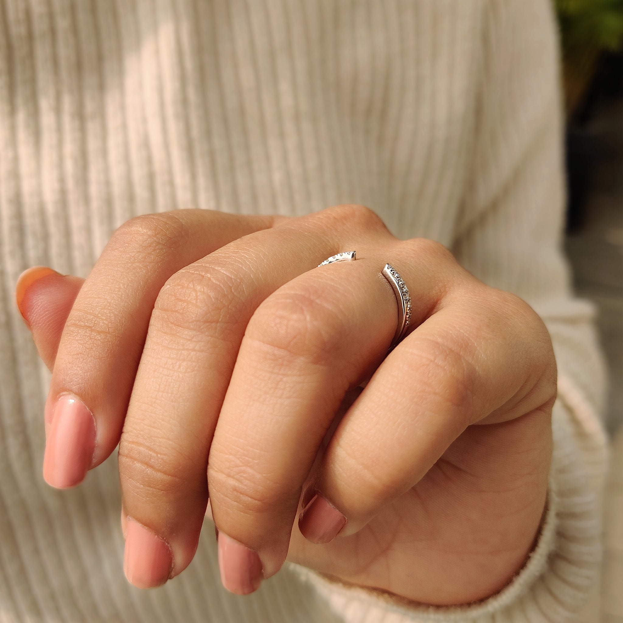 Round Cut Diamond Band in a minimalist style.
