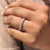 Half eternity moissanite band with clean edges and alternating stone shapes.