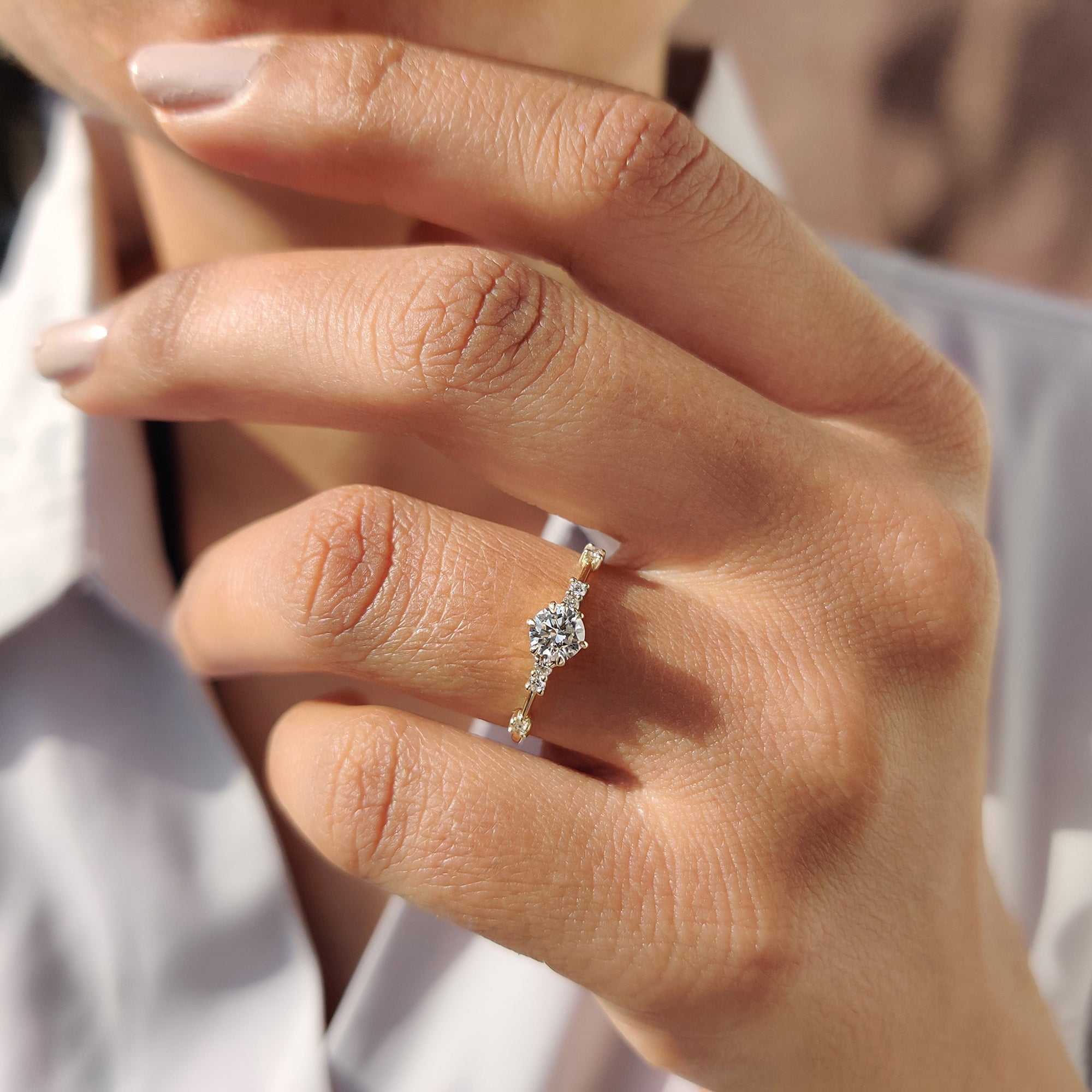 Yellow Gold Engagement Ring with a classic round diamond.
