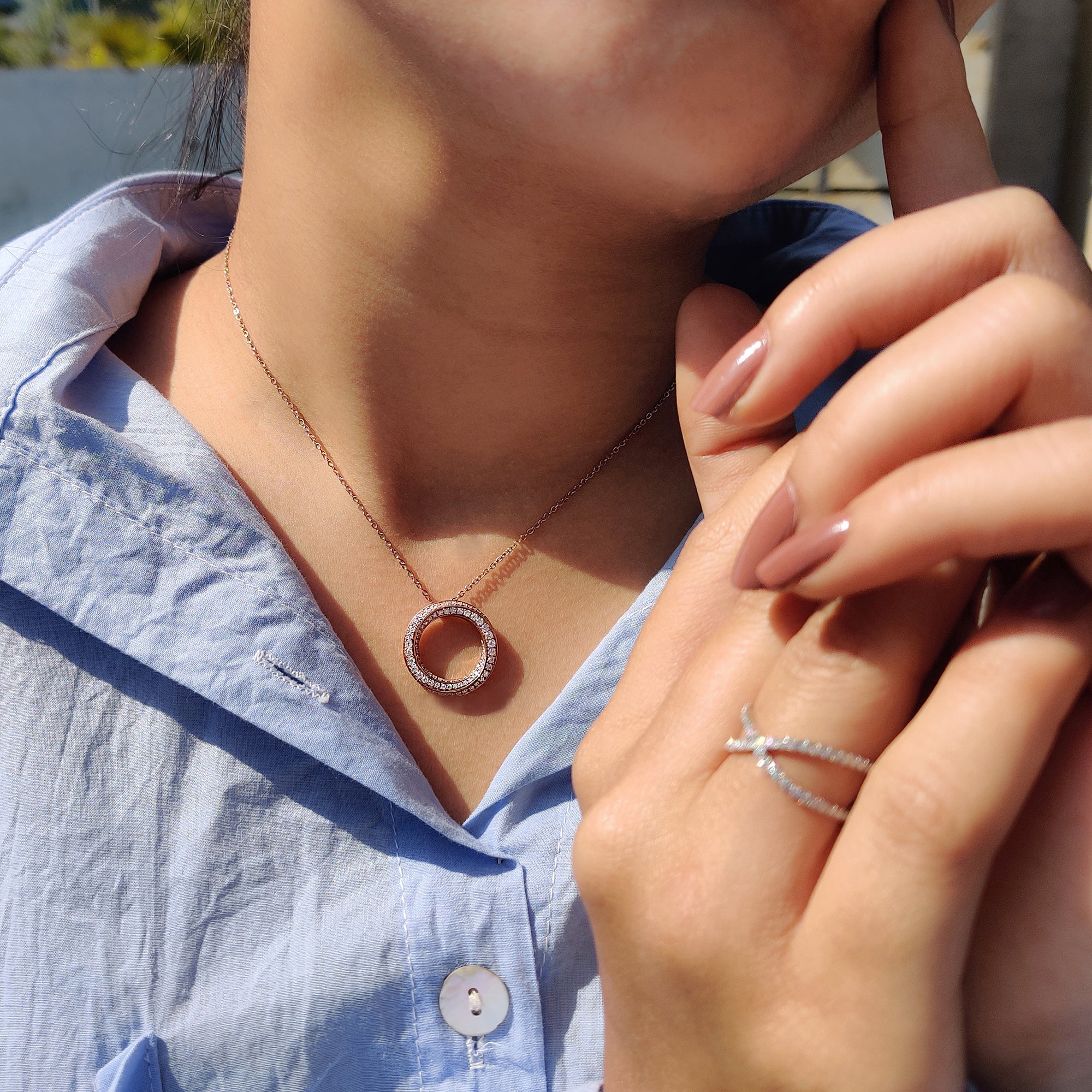 Rose gold pendant featured in Twisted Multi Circle Moissanite Pendant for daily wear.
