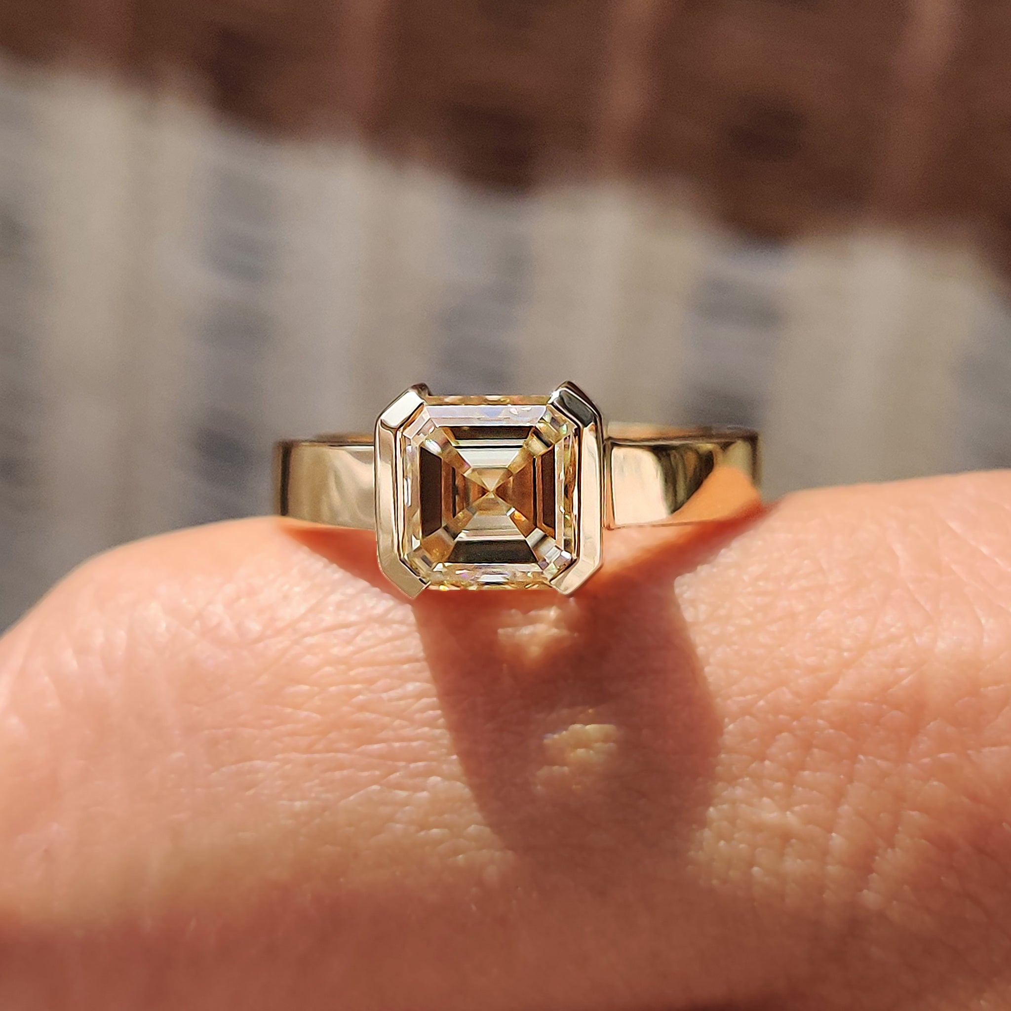 Custom Asscher cut Moissanite engagement ring in yellow gold