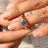 Yellow gold engagement ring with twisted rope band