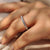 Round cut diamond wedding band in white gold.
