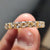 Carat Diamonds wedding band in shared prong setting with light yellow moissanite stones.