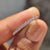Round cut wedding band with sparkling diamonds.
