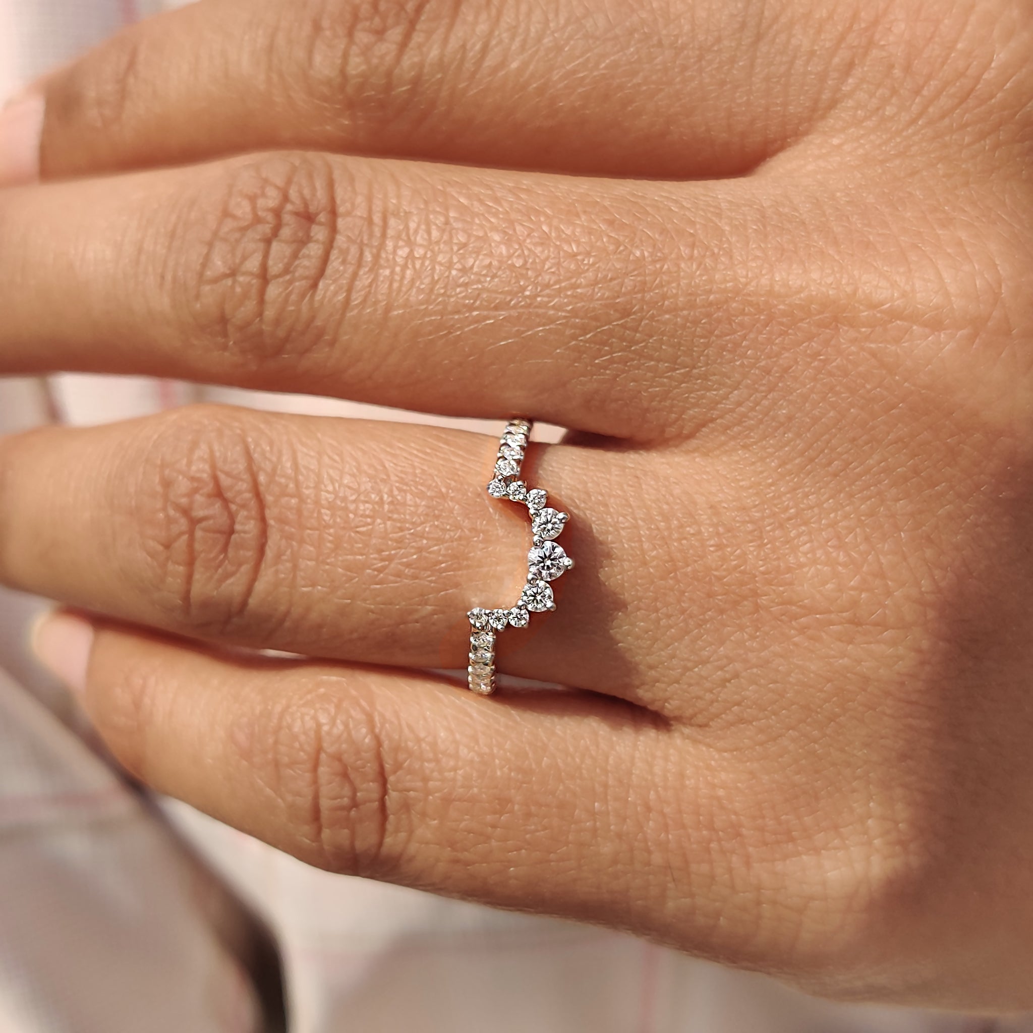 Unique double row chevron band in rose gold for a bold wedding ring choice.
