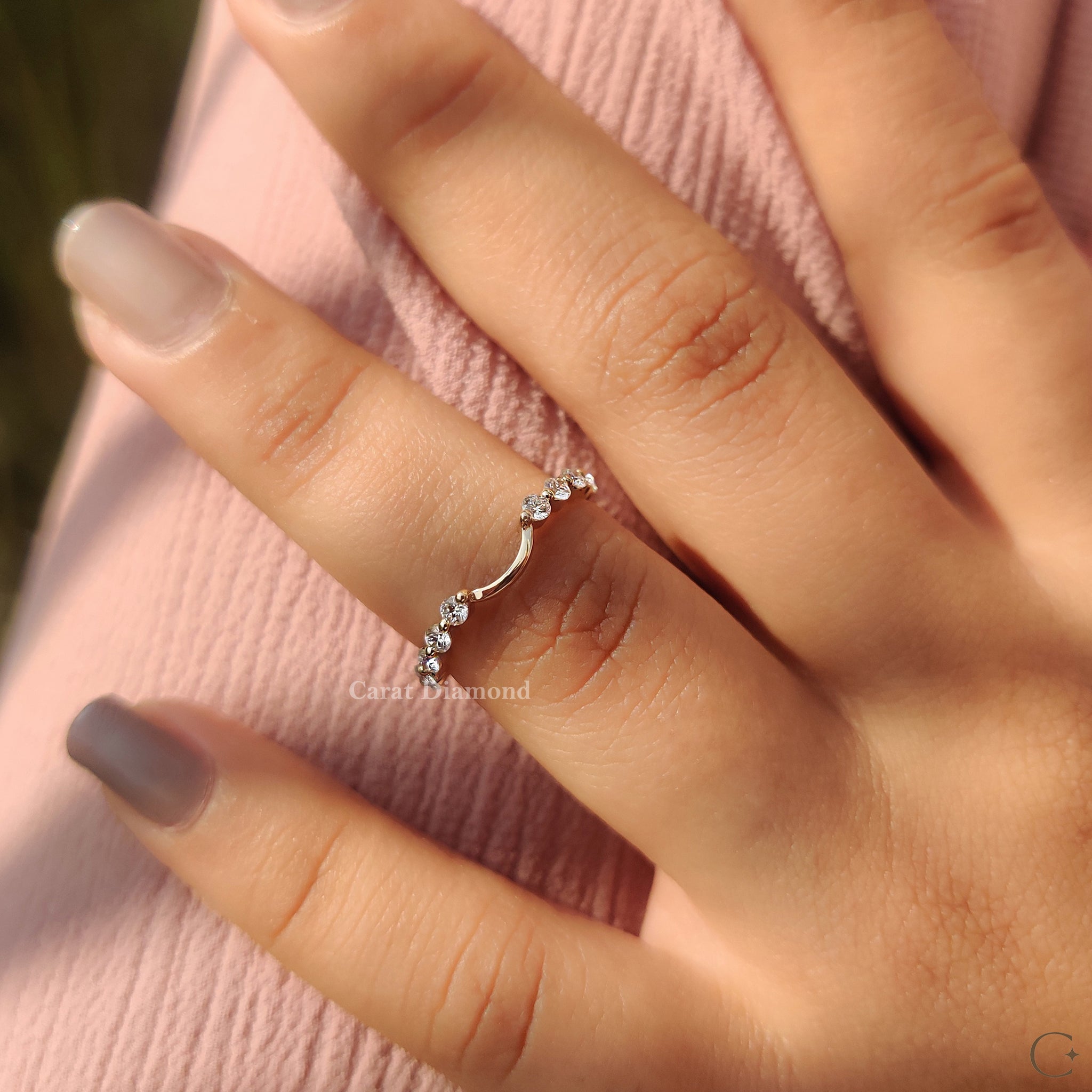 Handmade band with carat diamonds and a curvy wedding band design.