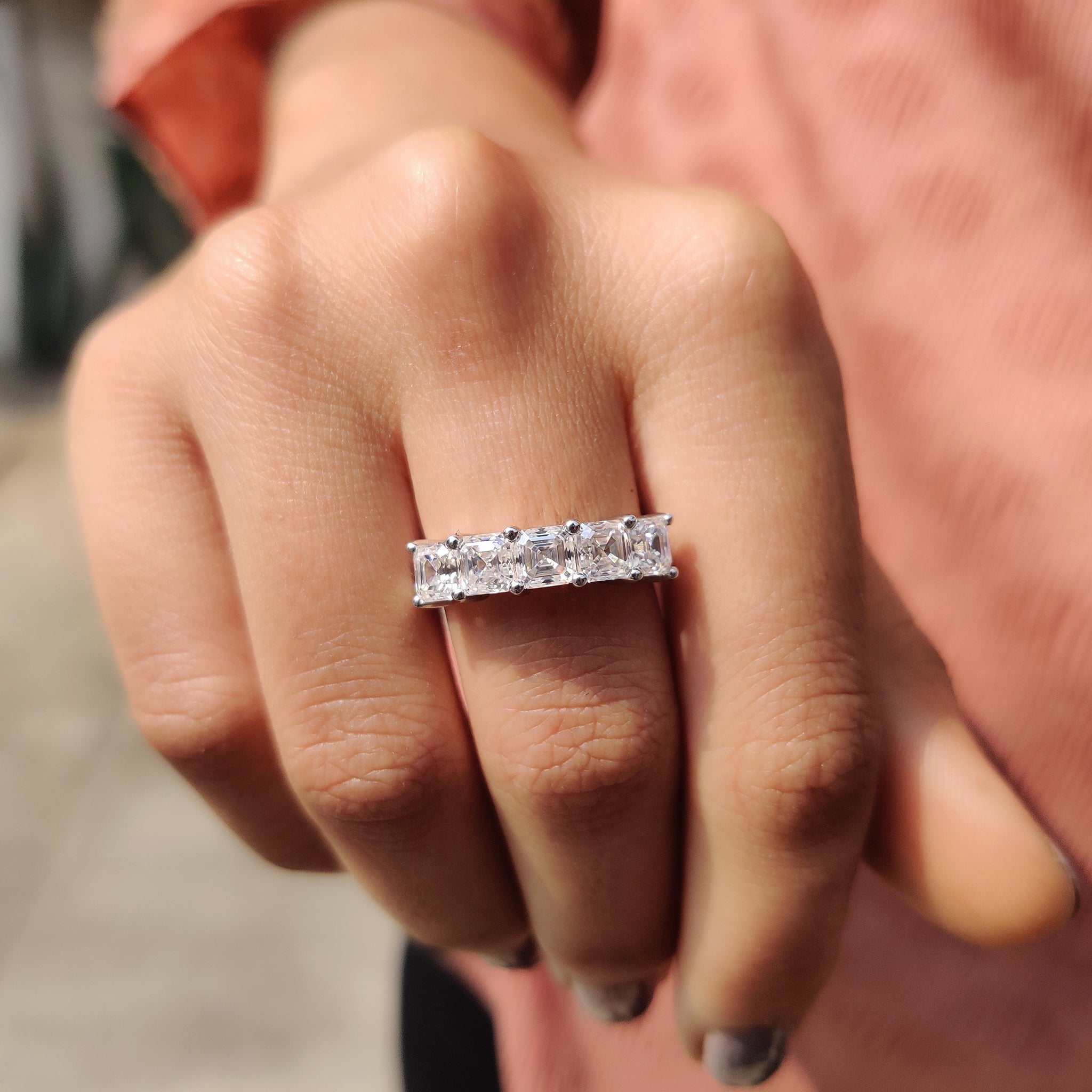 5 stone wedding band features a balanced row of brilliance.
