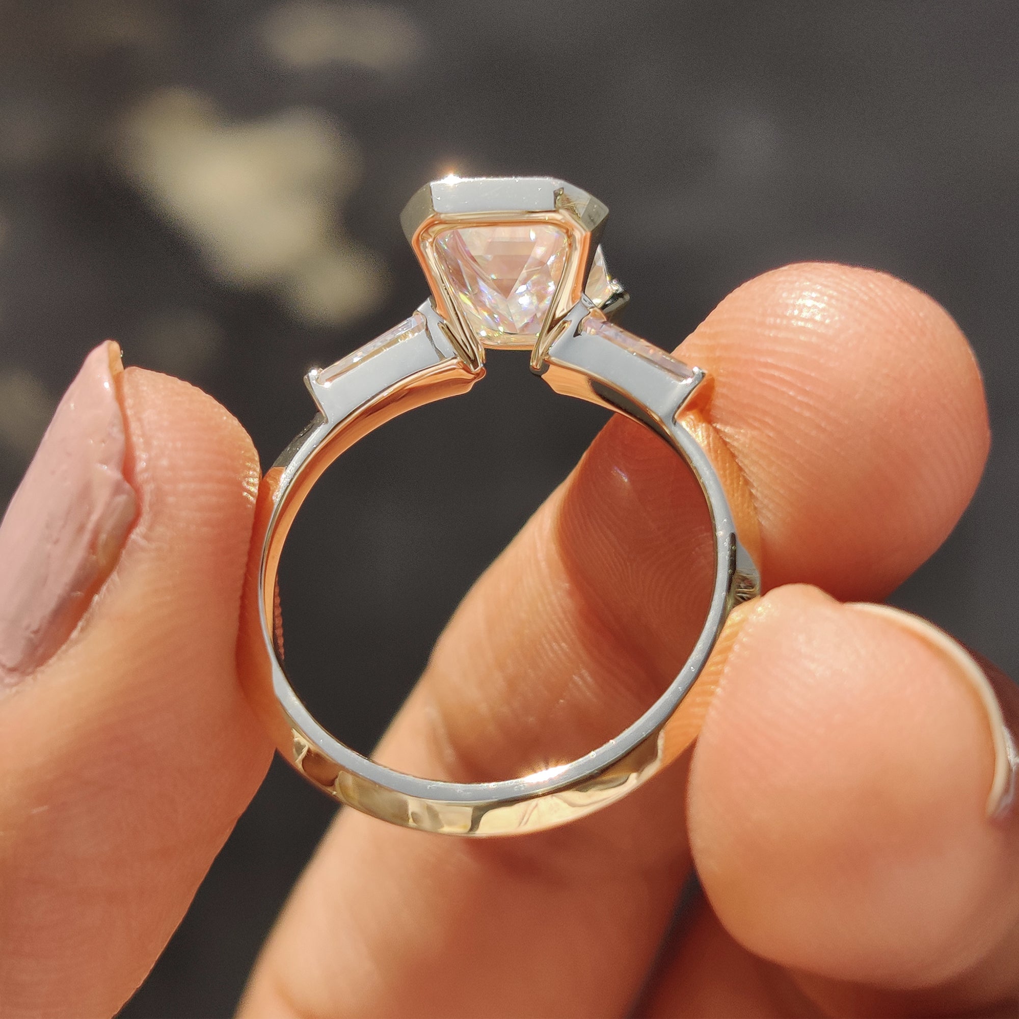 Three stone engagement ring with open gallery setting