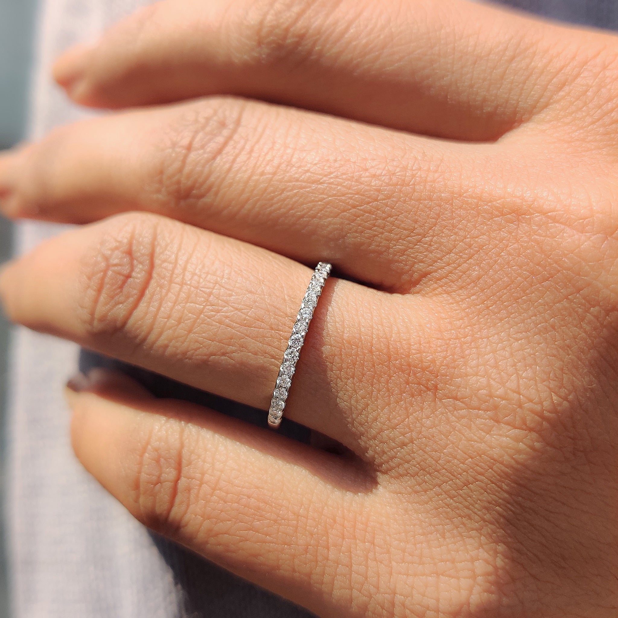 Classic white gold wedding band with sleek design.
