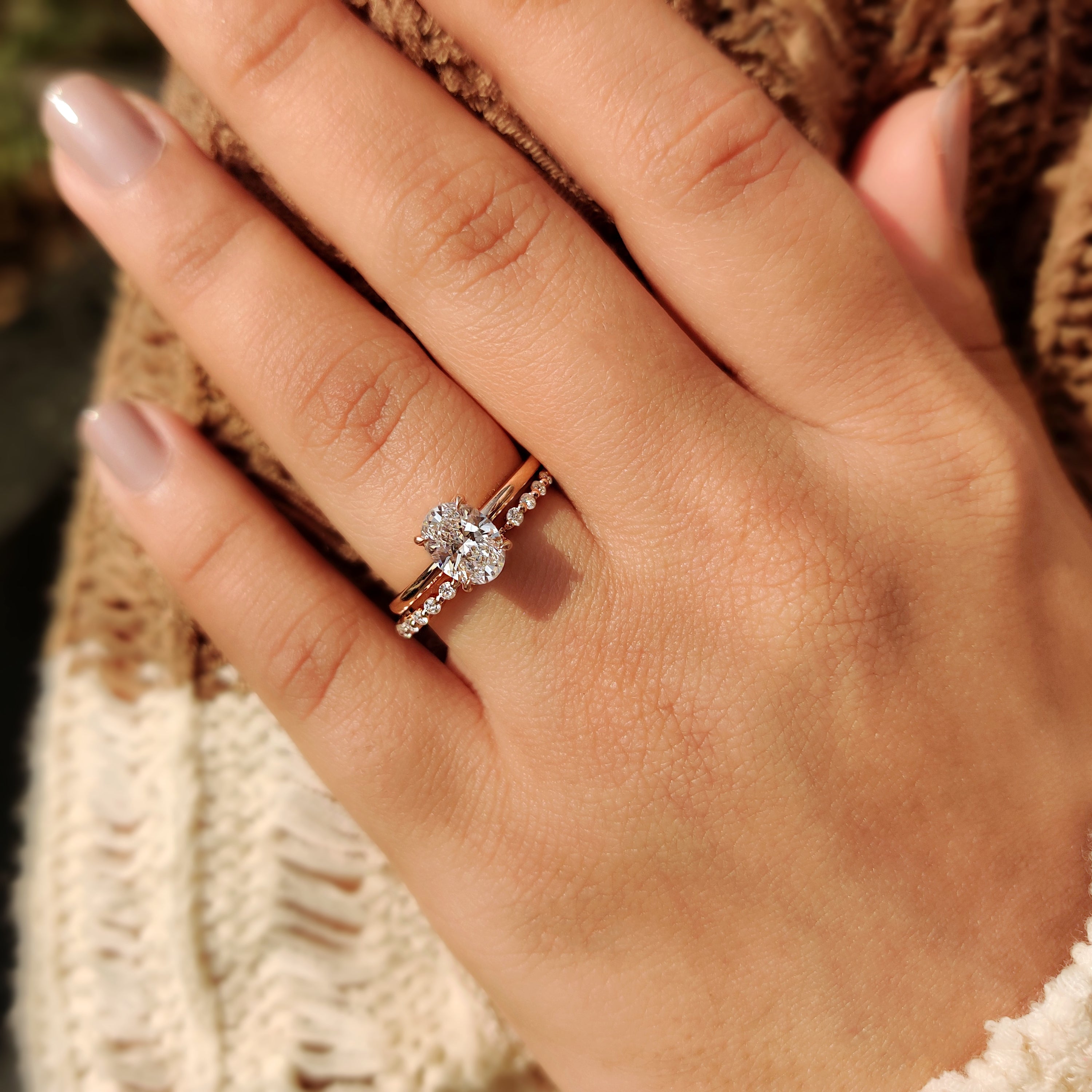 Buy wedding band with shared prong design.
