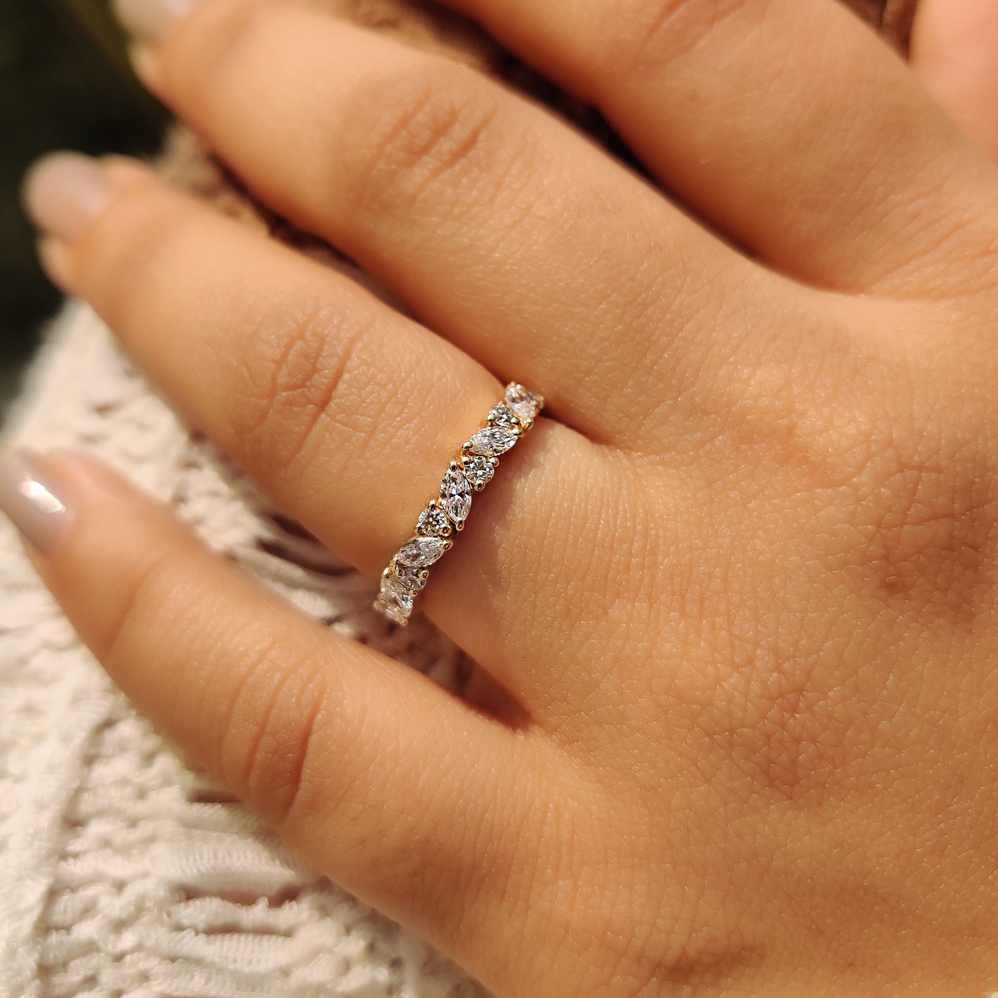Handmade band featuring round lab diamonds.
