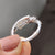 Bypass setting band crafted in white gold.