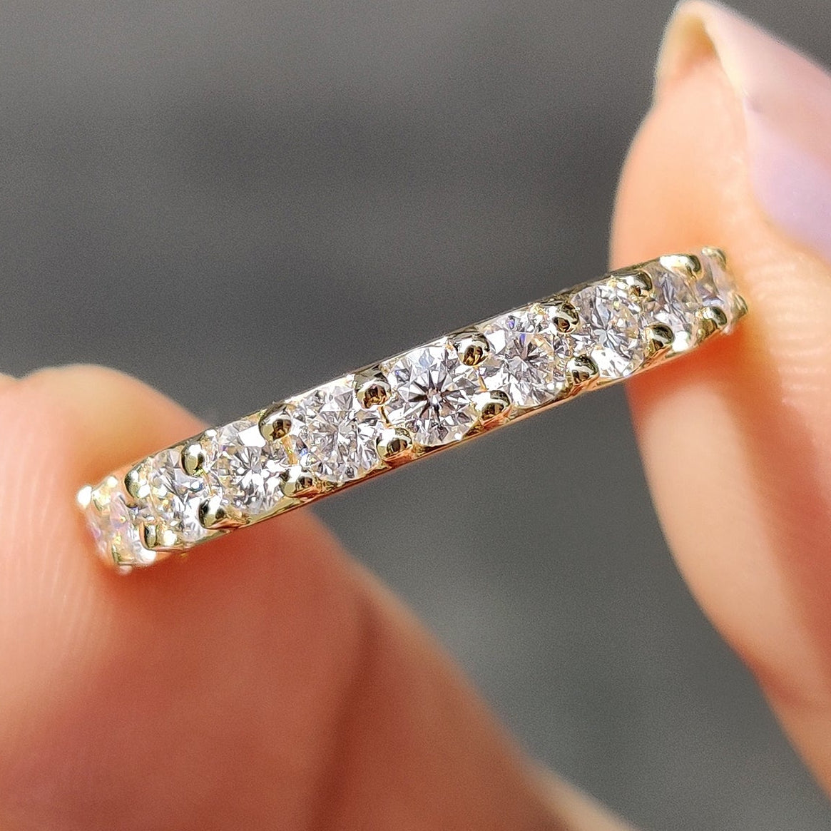 Moissanite eternity band with carat diamonds band.