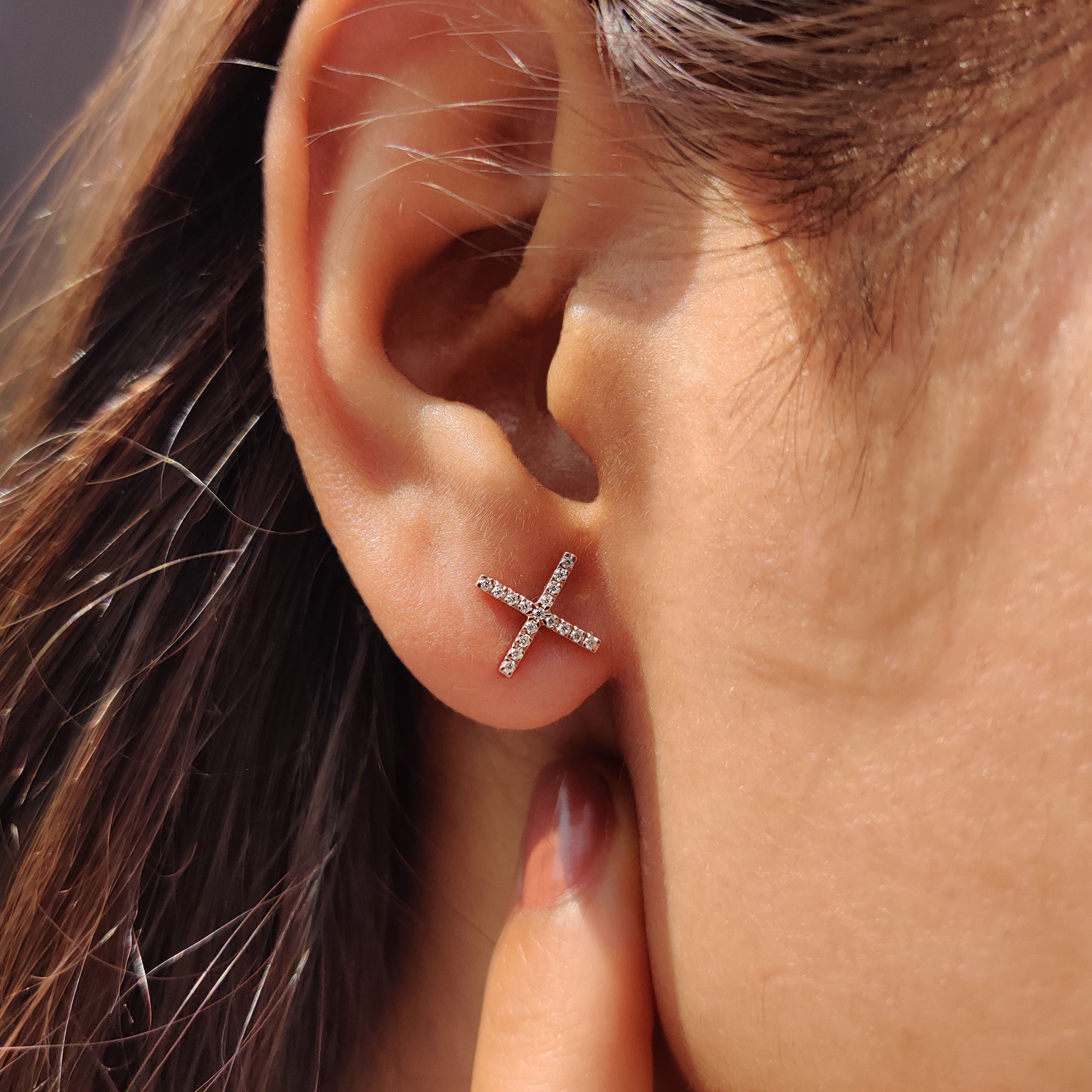 Wedding gifts including X shaped Moissanite Earrings with stud earrings style.
