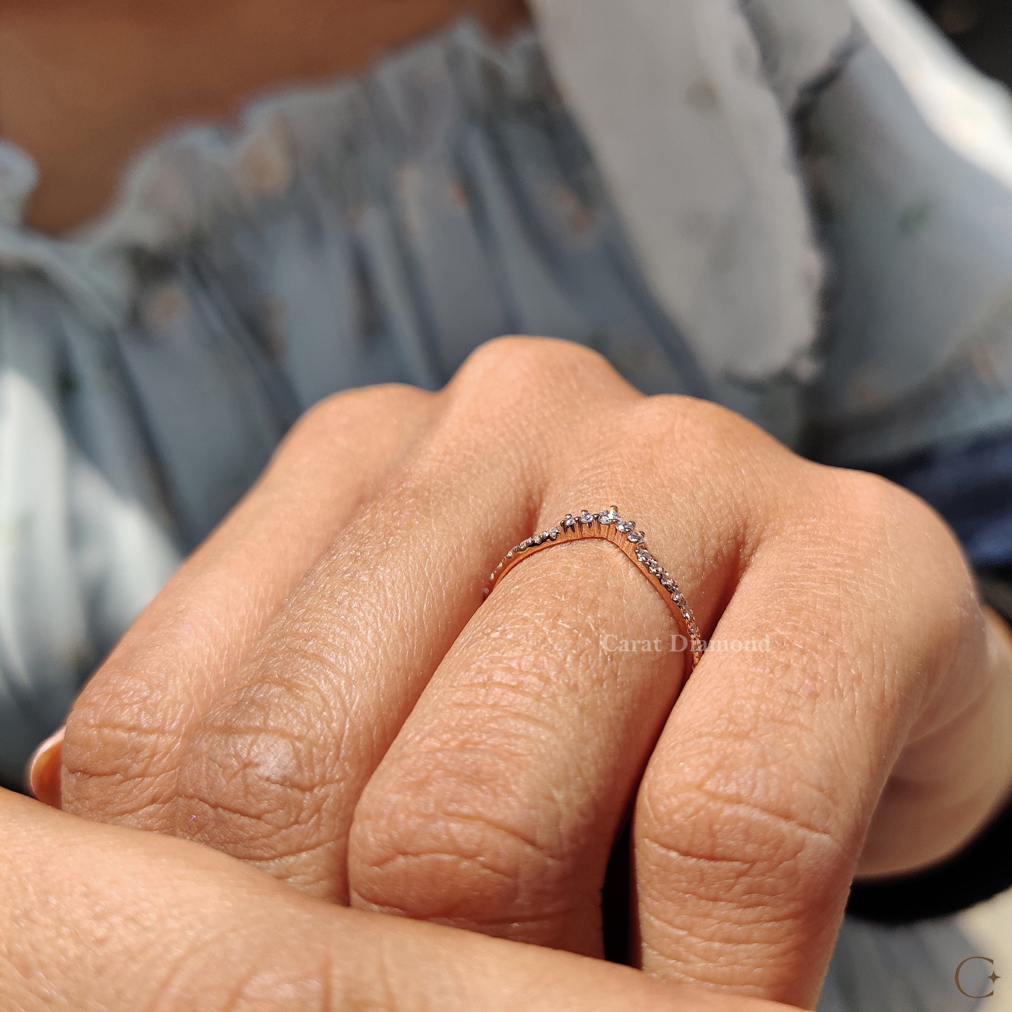 Custom wedding band designed with unique stone placement.
