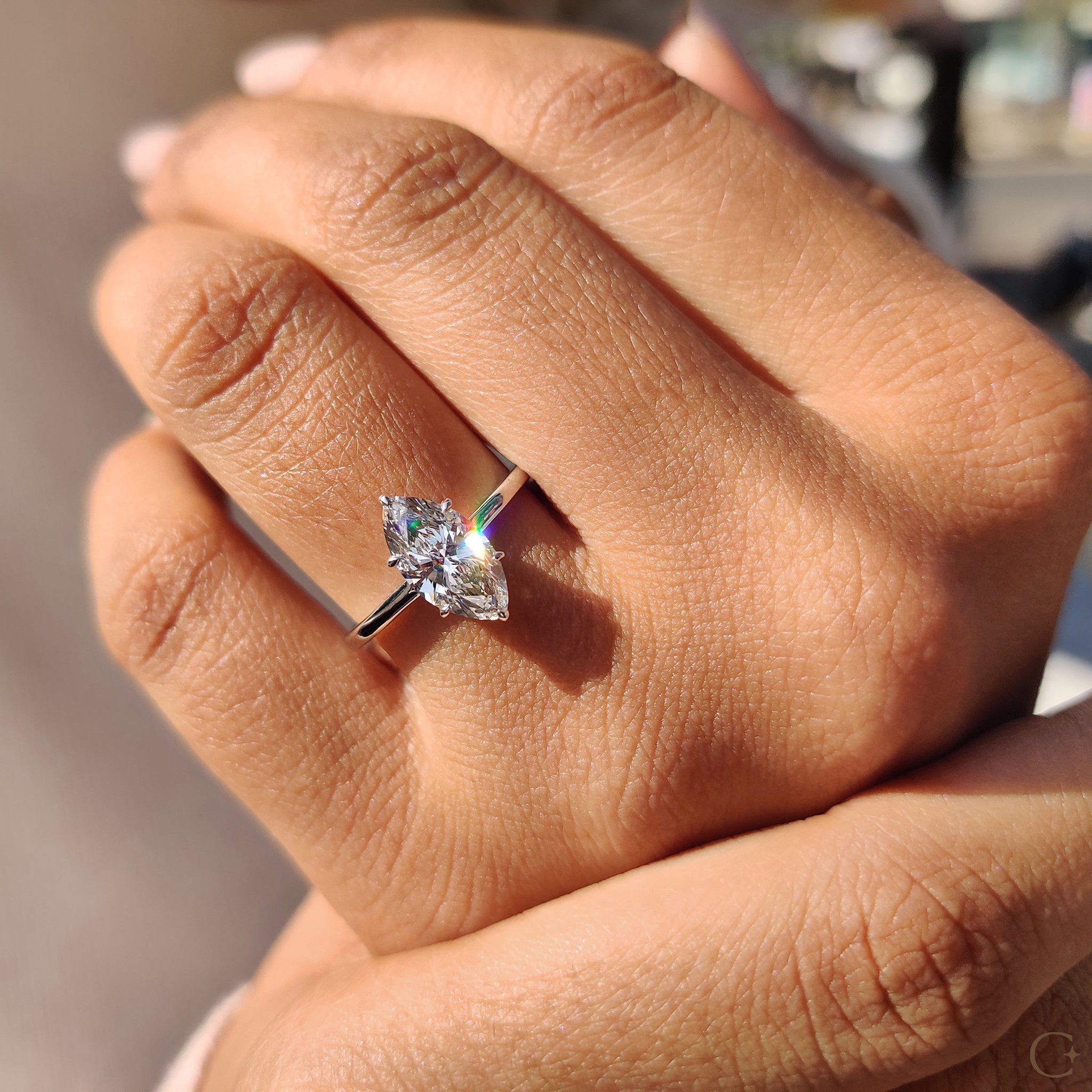 Classic round cut diamond engagement ring with a brilliant shine.
