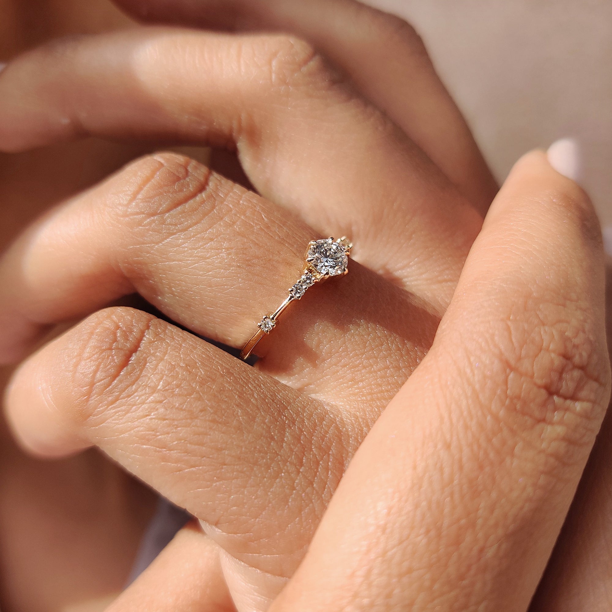 Round Diamond Engagement Ring with a gorgeous 7-stone design.

