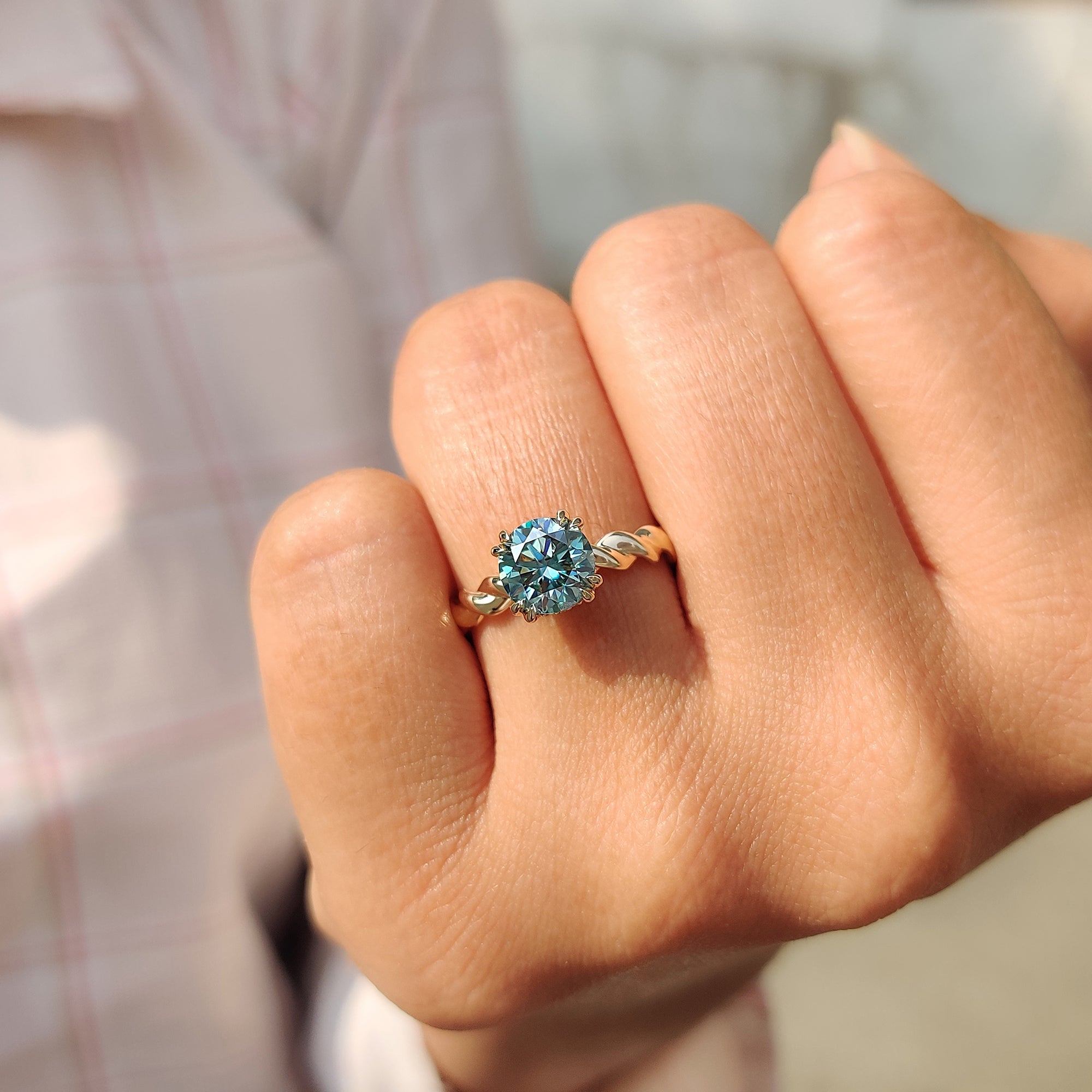 Moissanite engagement ring with double claw prong setting