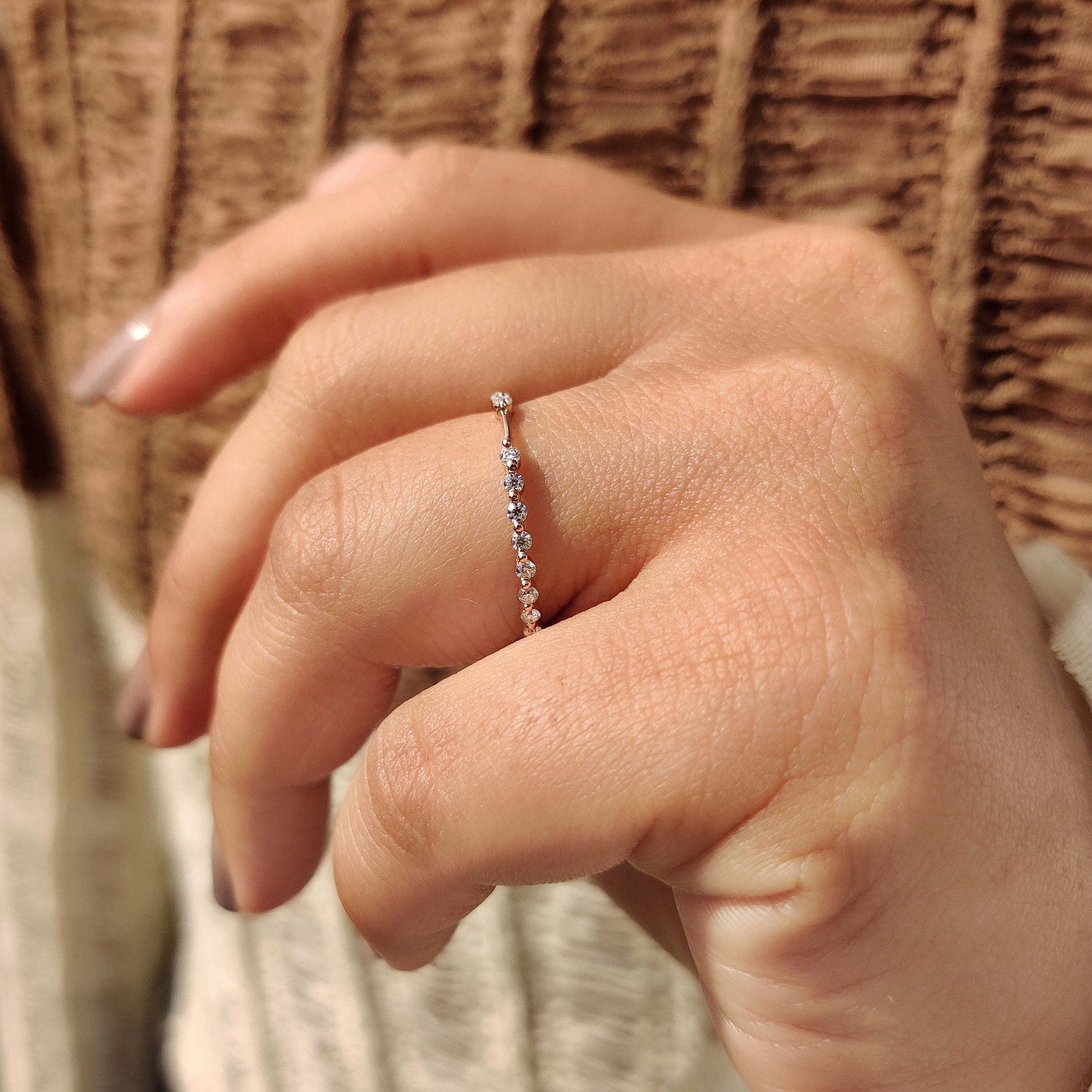 Simple wedding band featuring lab grown diamonds.
