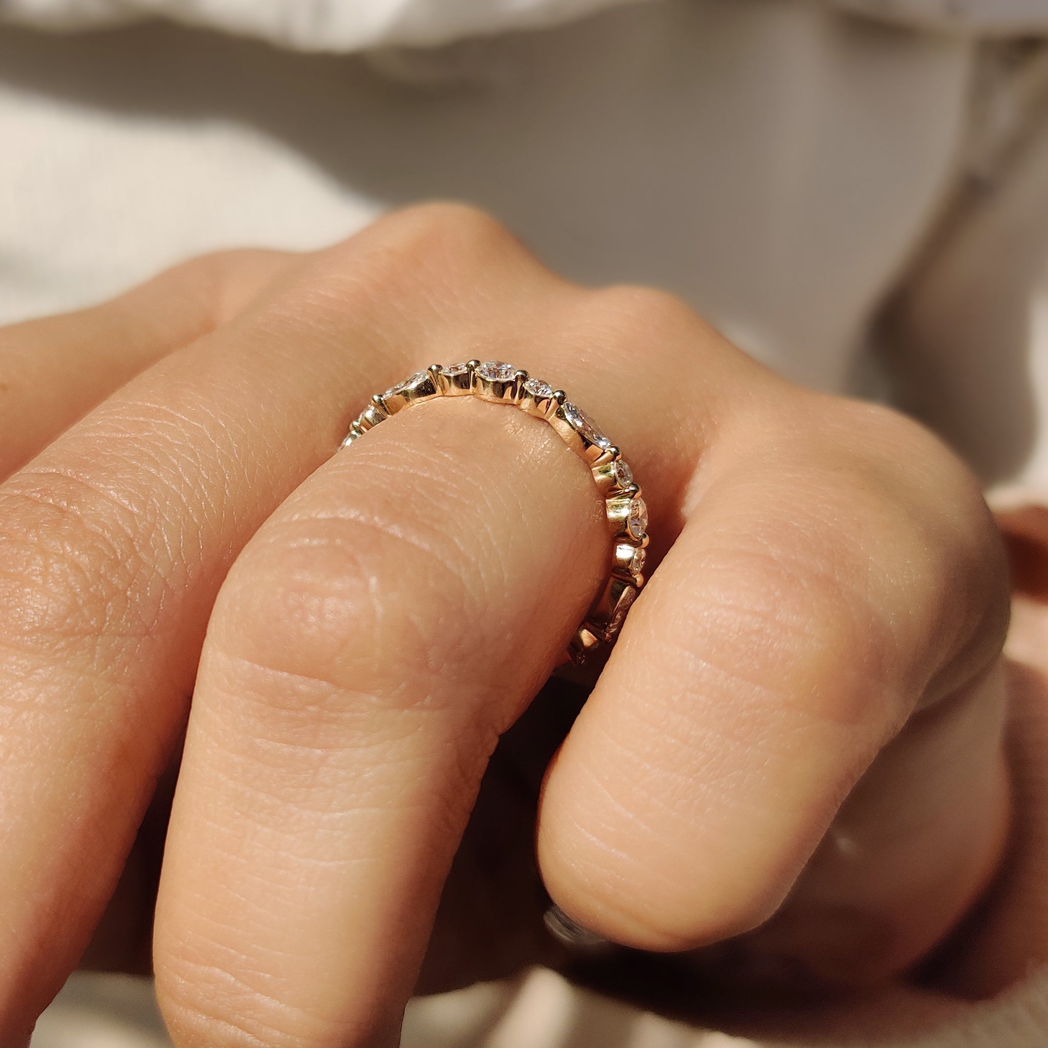Carat Diamonds wedding band in full eternity style.