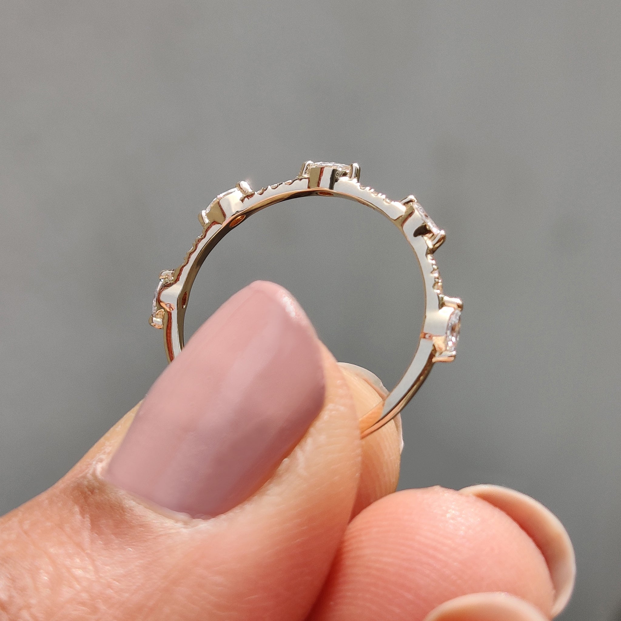 Lab grown diamond wedding band with eco-friendly appeal.
