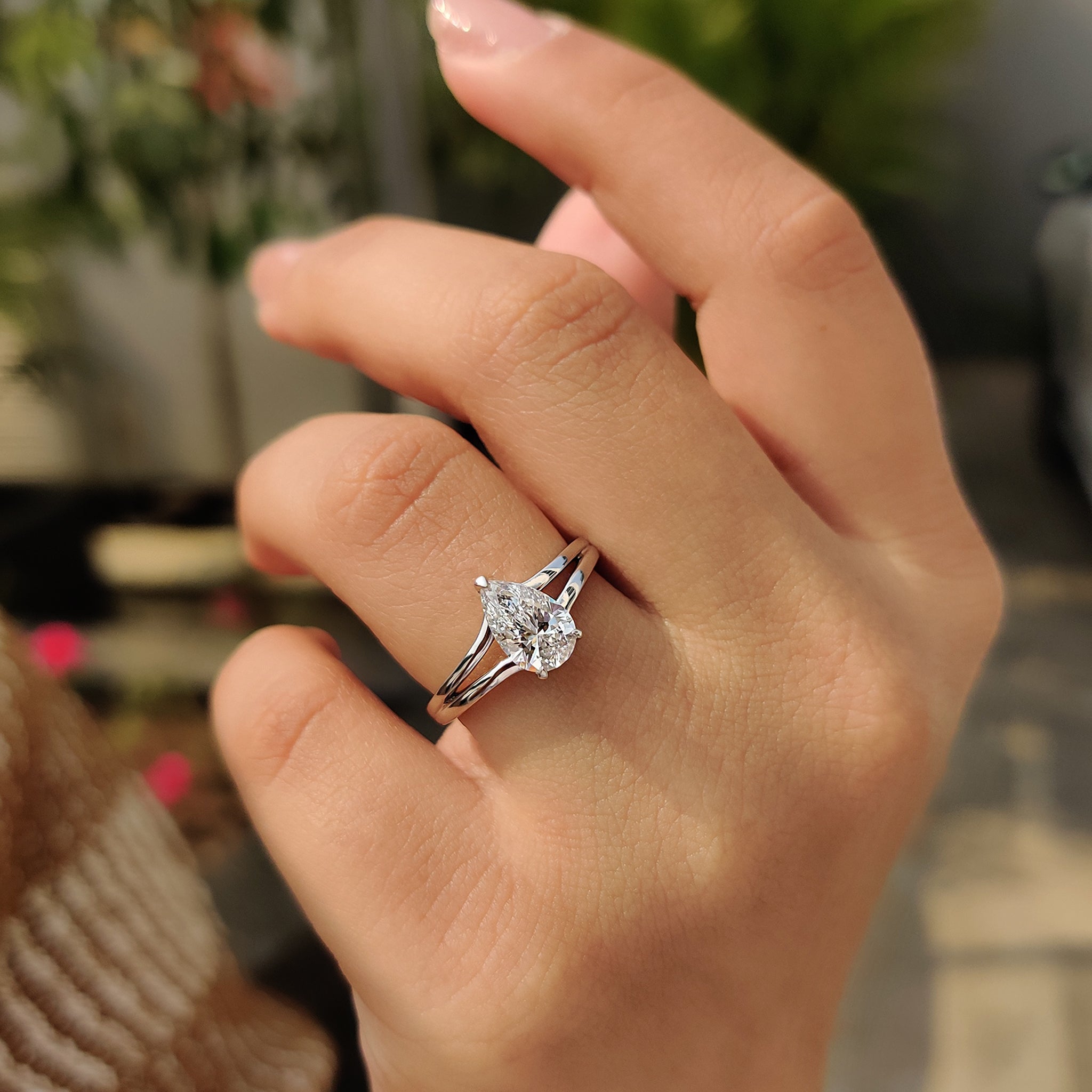 3 prong setting in a pear-shaped diamond ring offering maximum brilliance and security.
