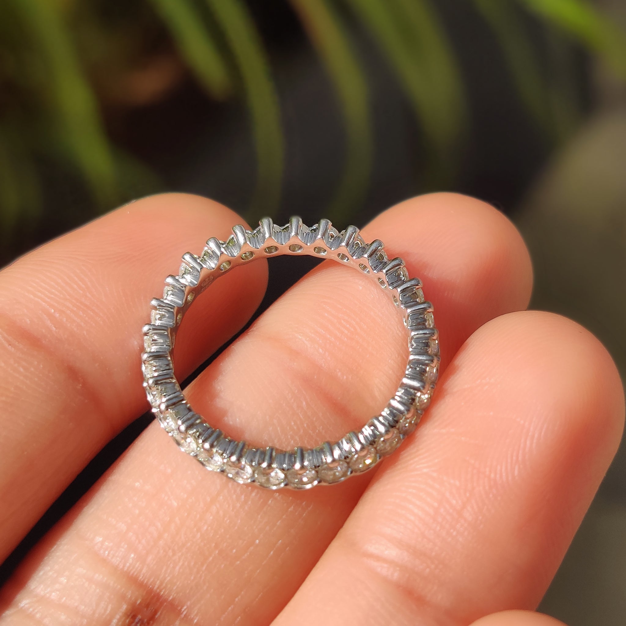 Carat Diamonds wedding band in white gold with full diamond look.
