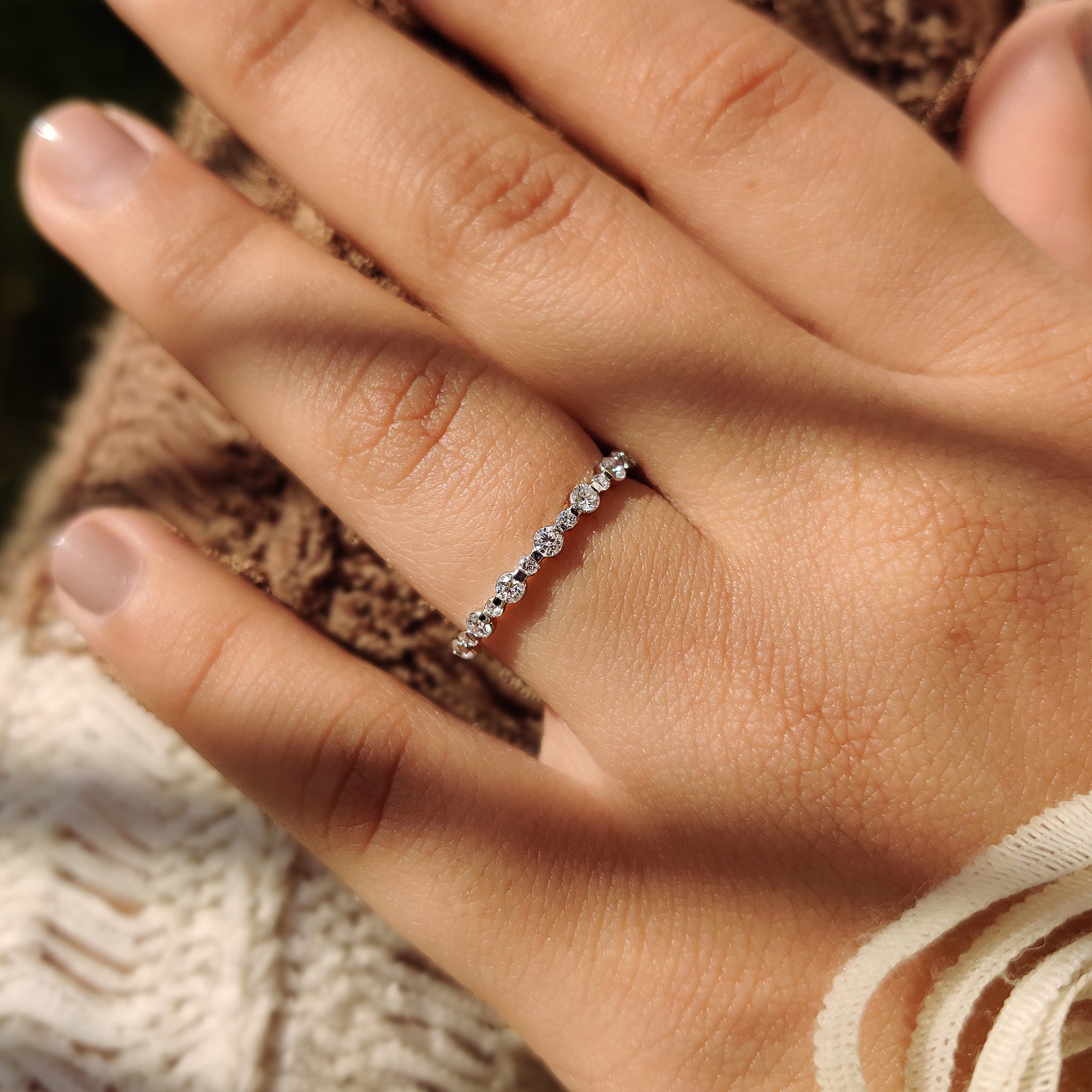 Half Eternity Wedding Band with round cut diamonds.
