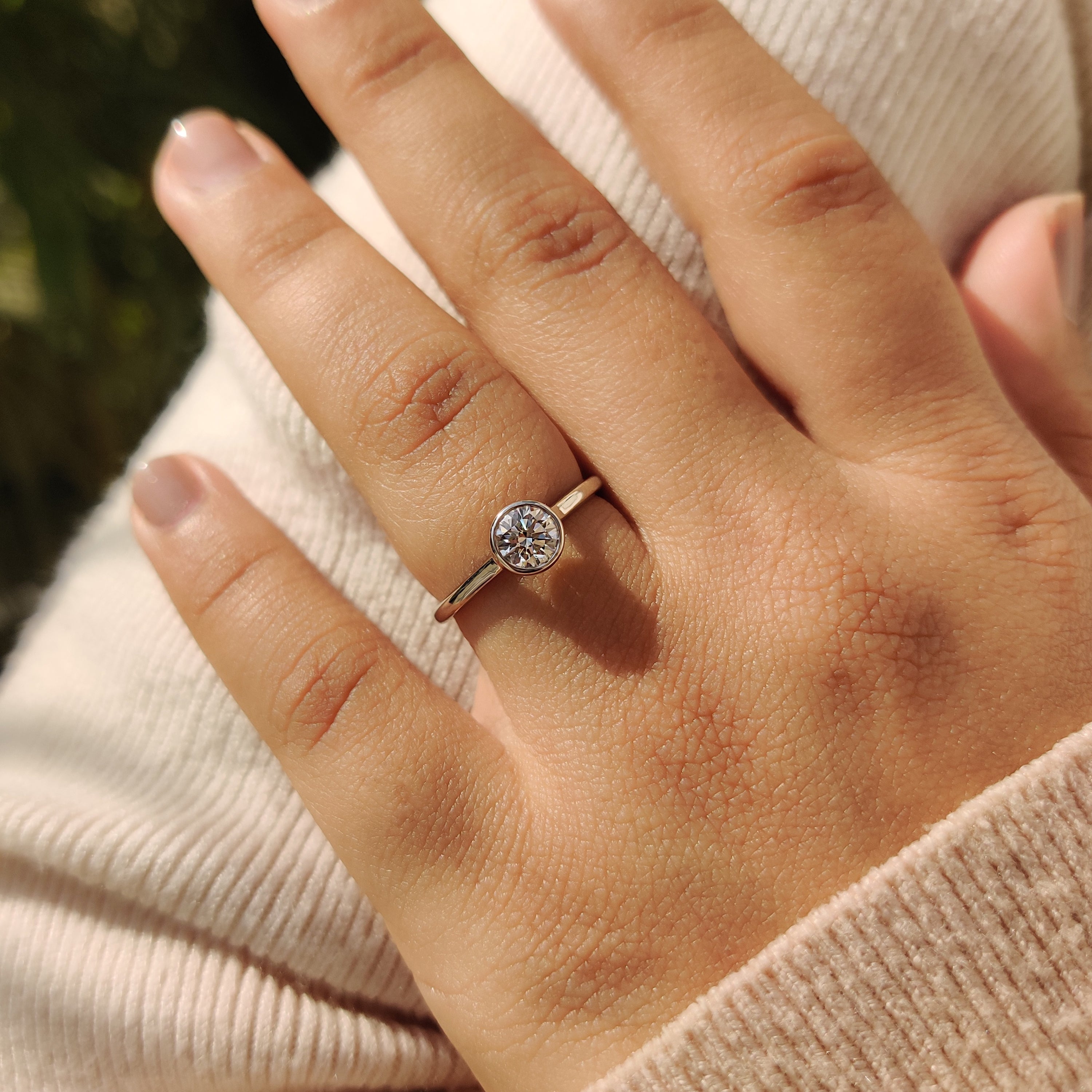 Bezel solitaire ring crafted for a contemporary look.
