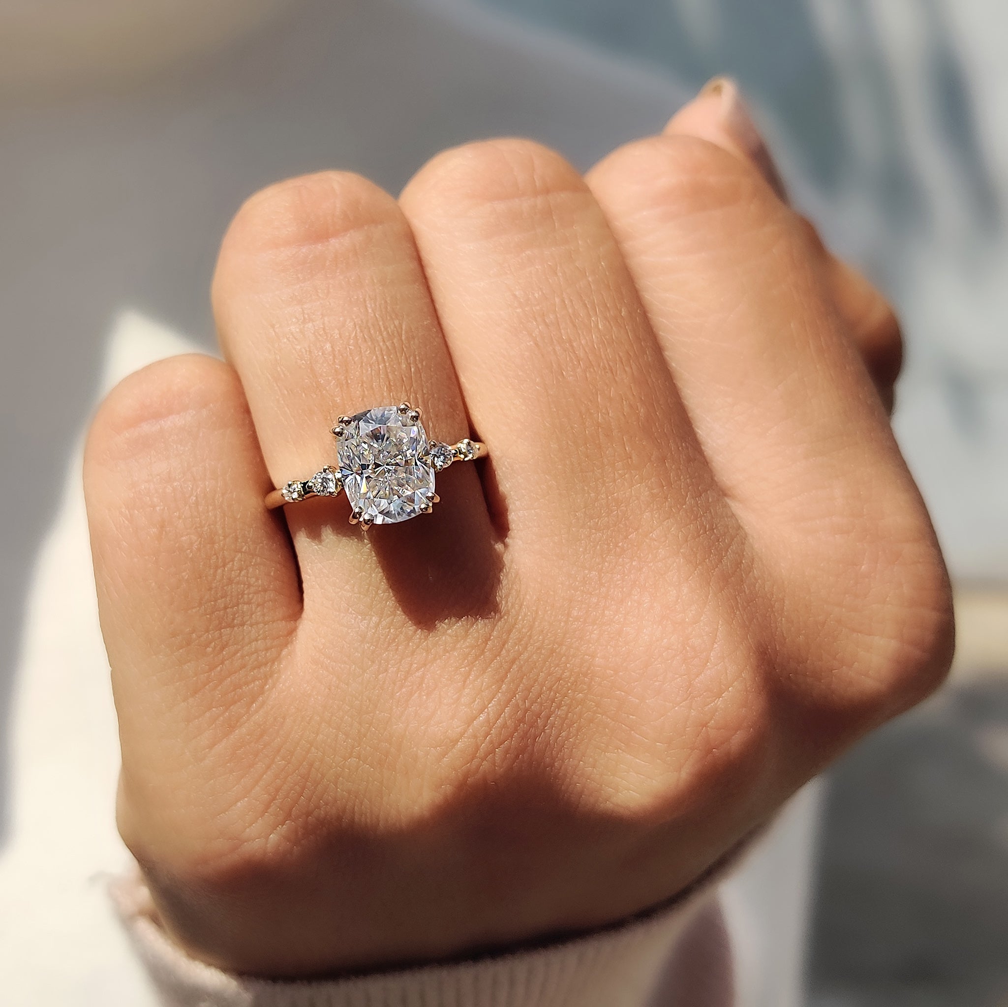 Elongated cushion cut ring with 4 side stones.
