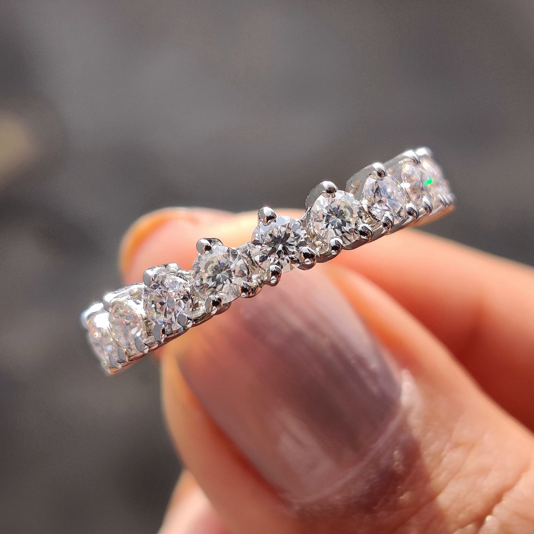 Moissanite wedding band handmade for a personalized touch and enduring sparkle.