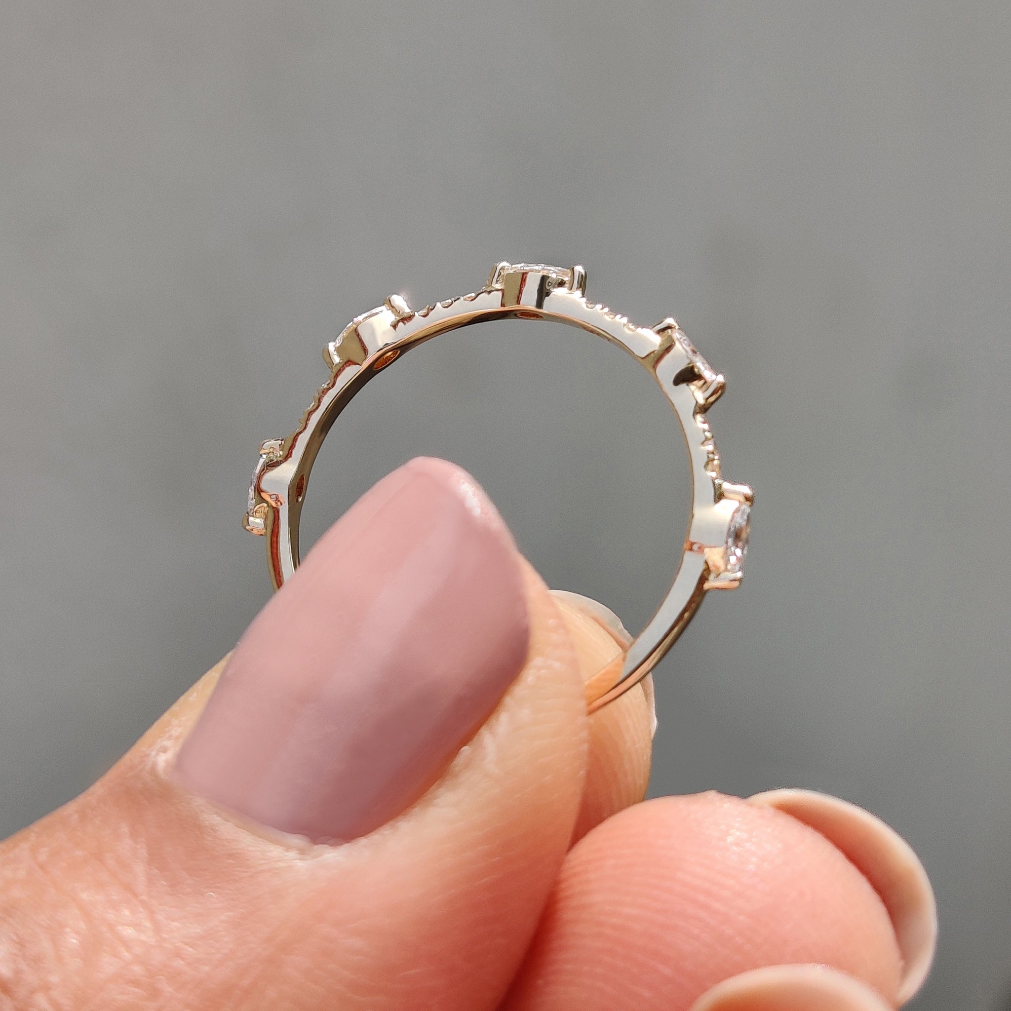 Lab grown diamond wedding band with eco-friendly appeal.
