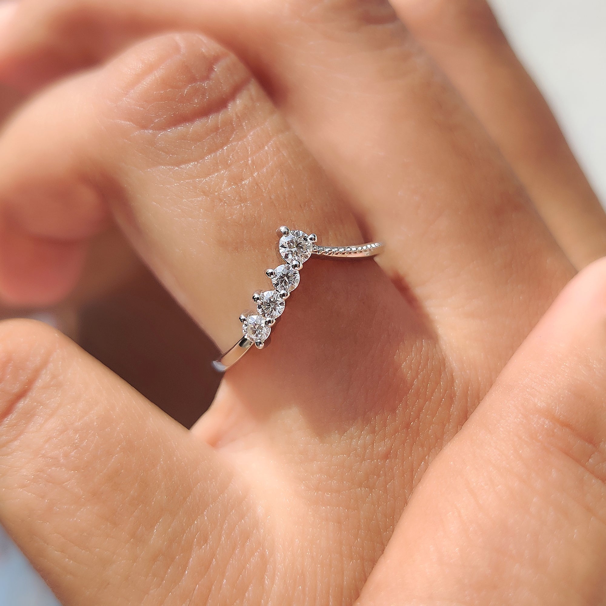 Milgrain wedding band with vintage-inspired curves.