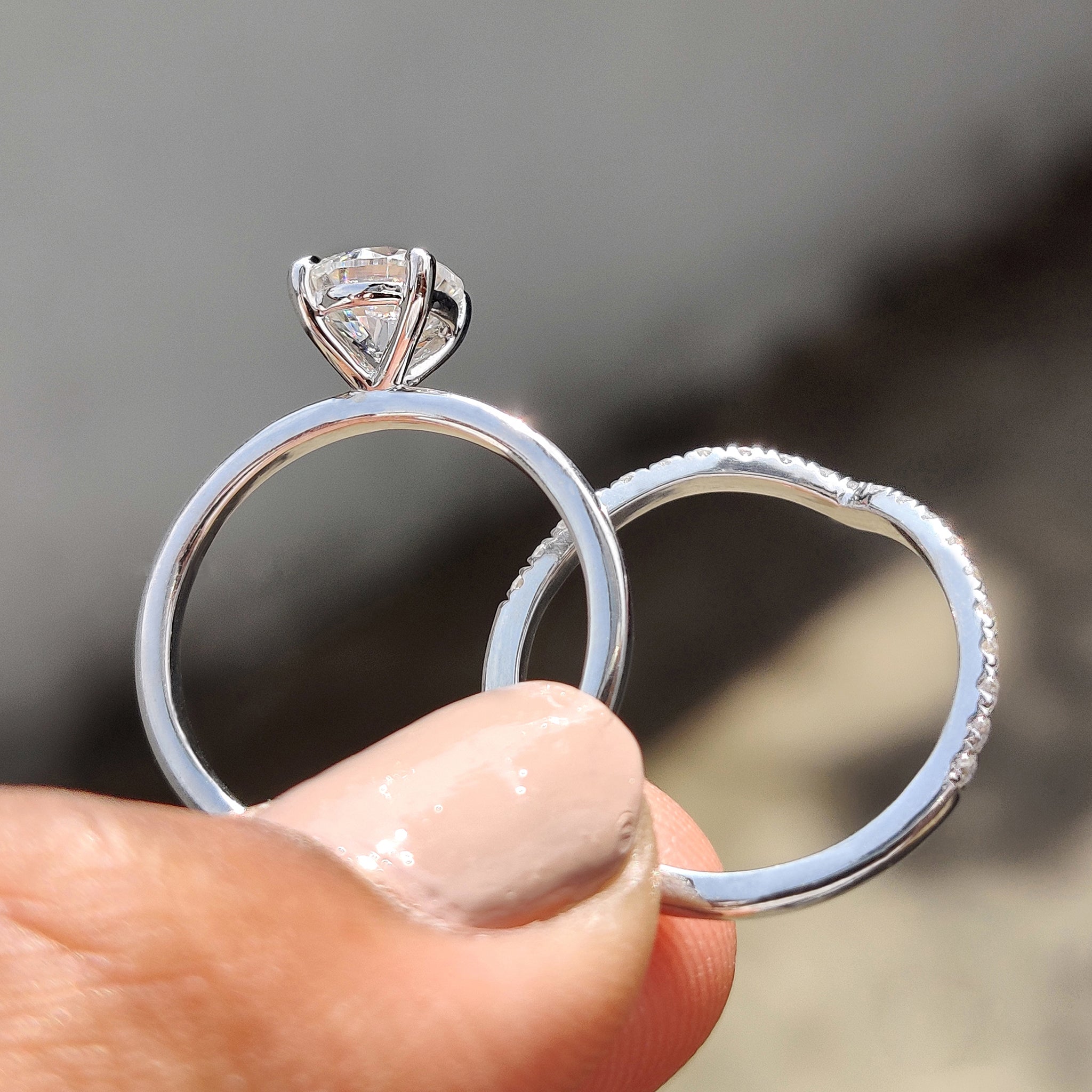 Moissanite bridal set with a half eternity wedding band in a v shaped design.
