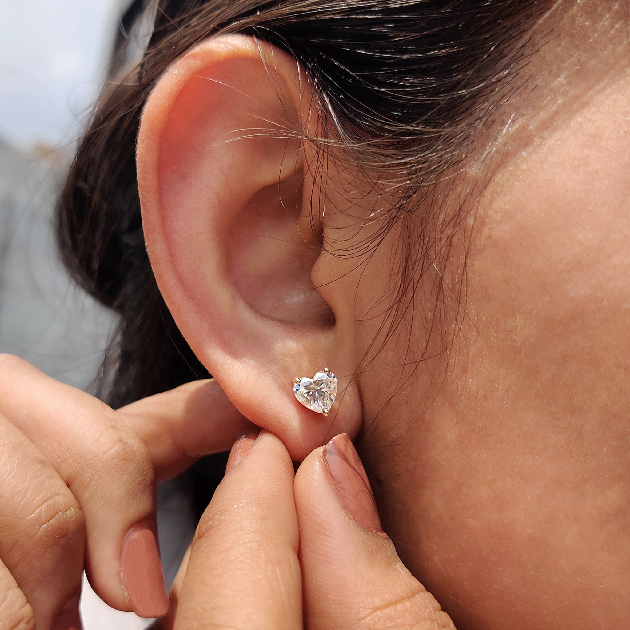 Heart cut earrings designed with Screw Back earrings and handmade jewelry detail.
